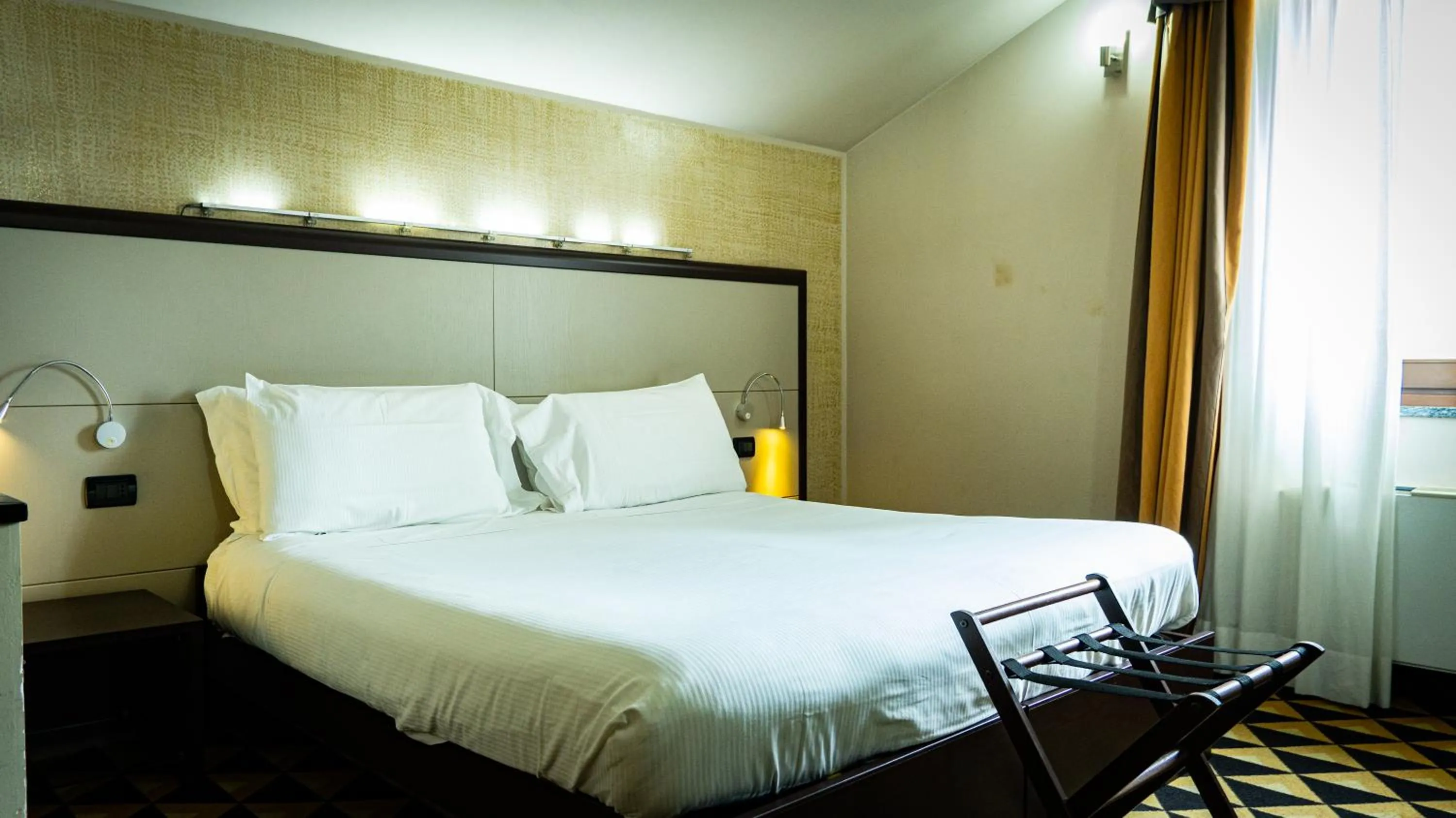 Bed in Hotel Au Soleil