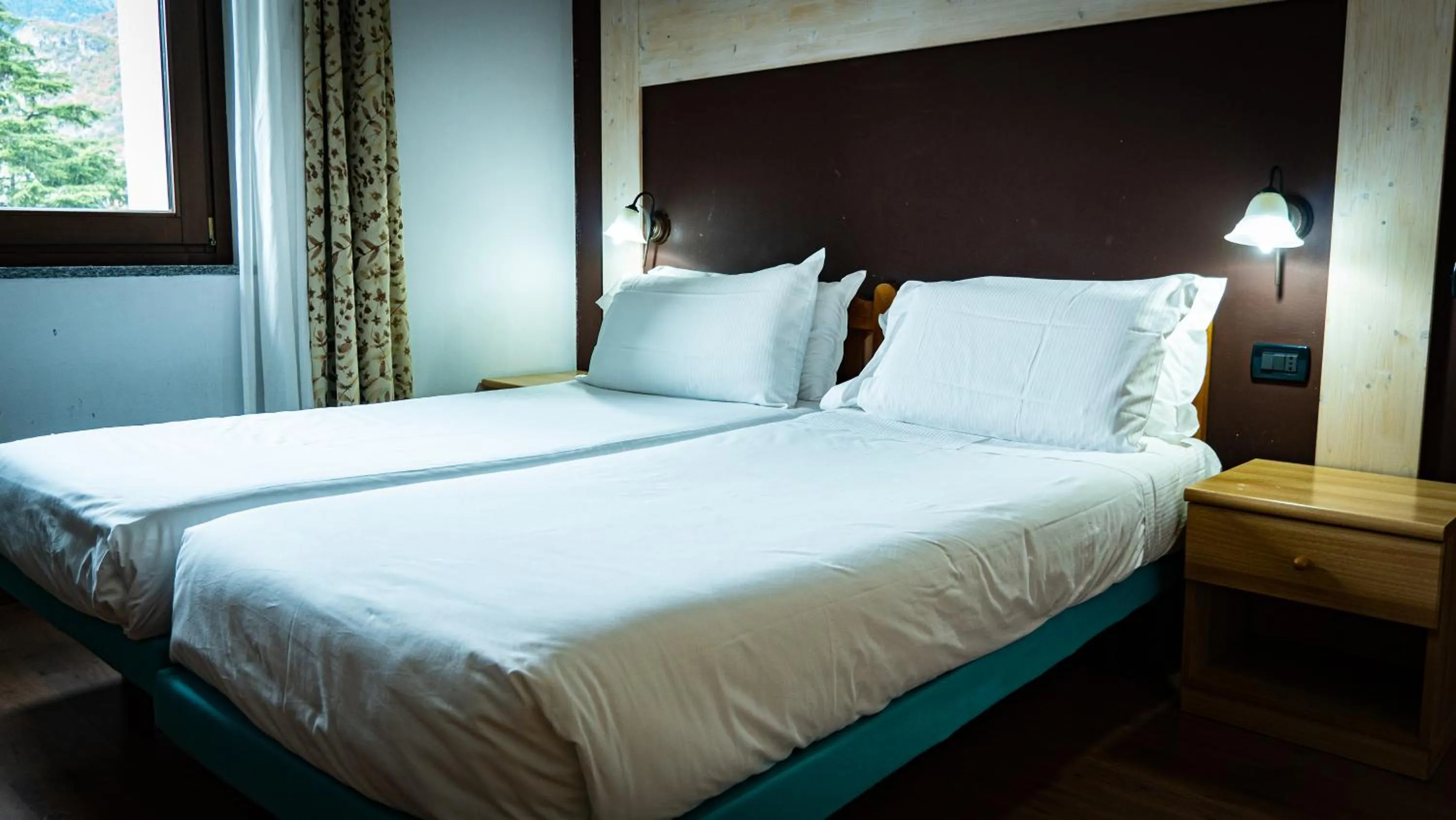 Bed in Hotel Au Soleil