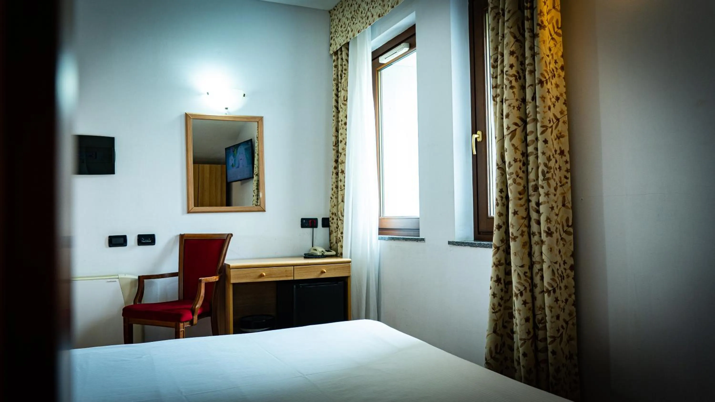 Bed in Hotel Au Soleil