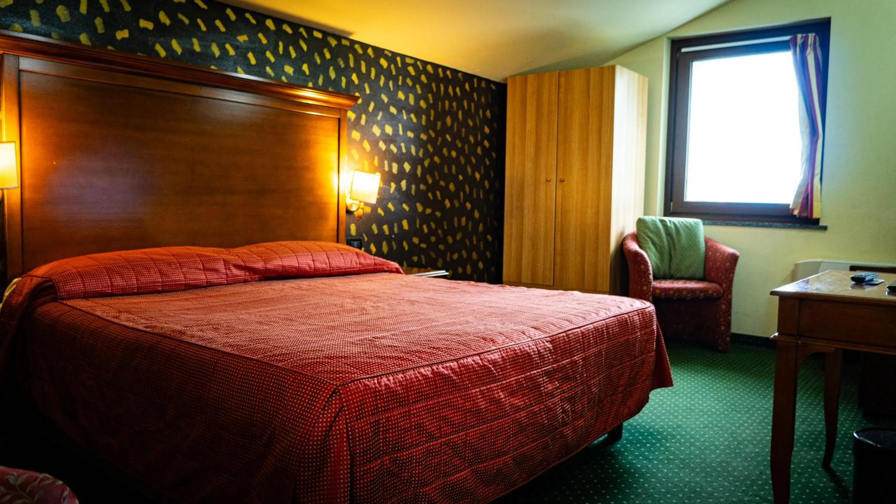 Bed in Hotel Au Soleil