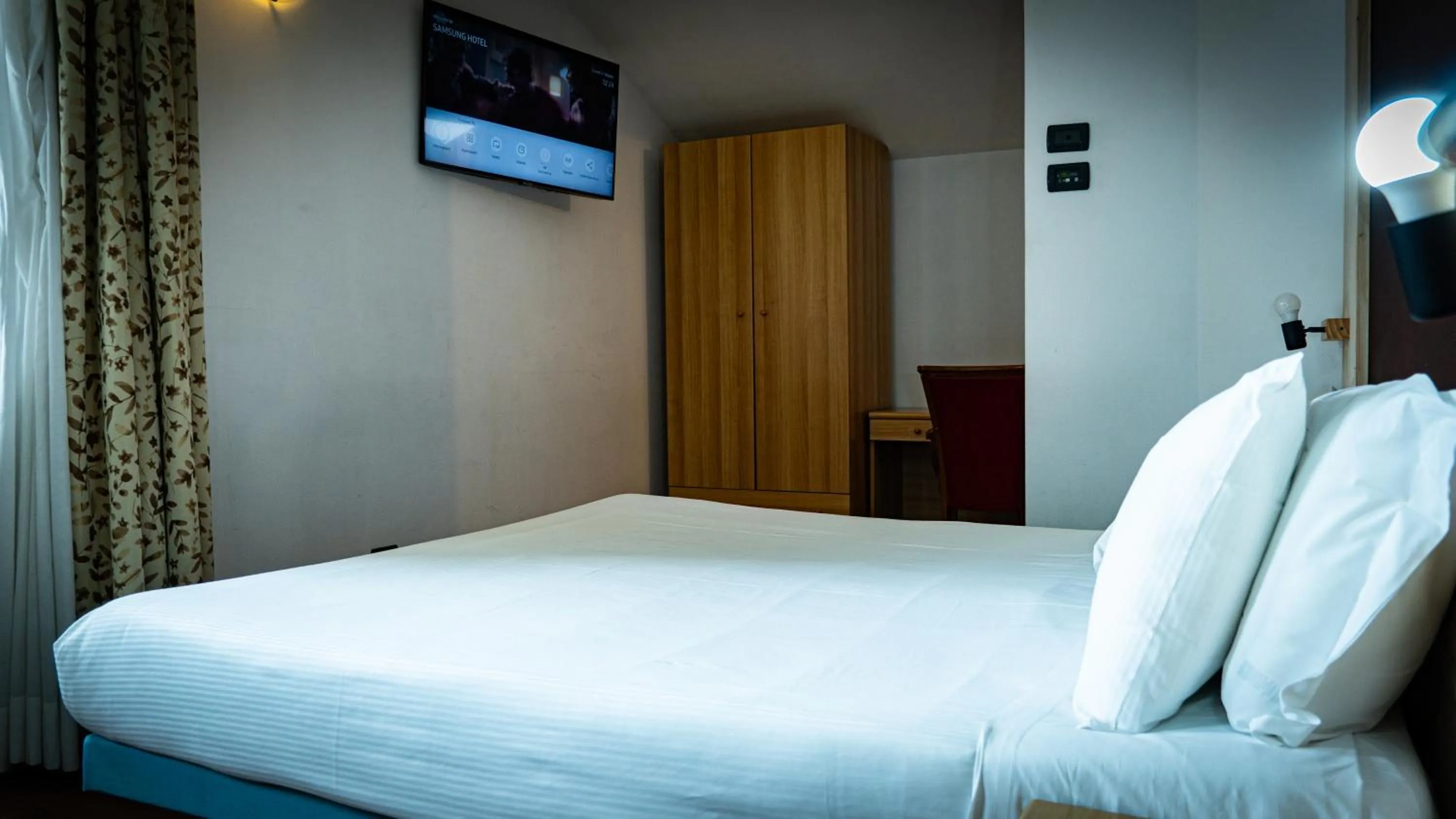 Bed in Hotel Au Soleil