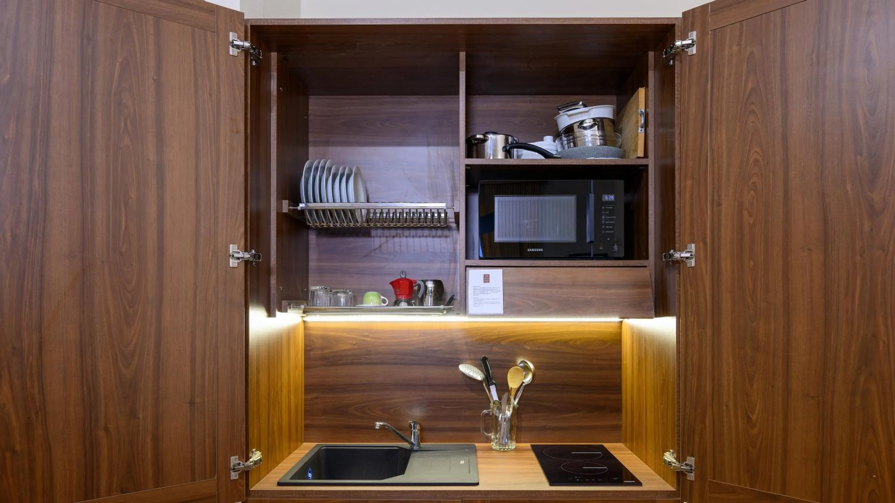 Kitchen or kitchenette in Albergo Reggio