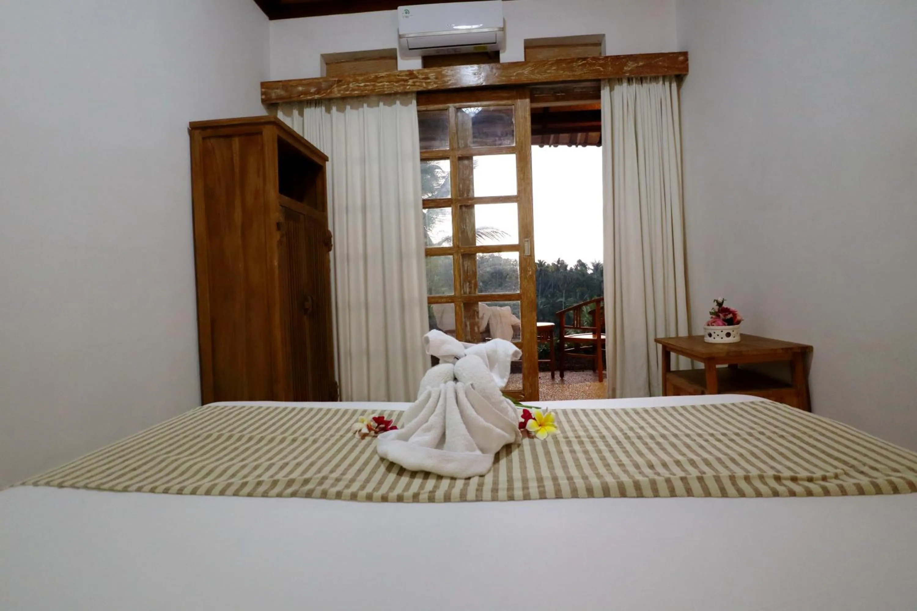 Bed in Aventus Resort Ubud