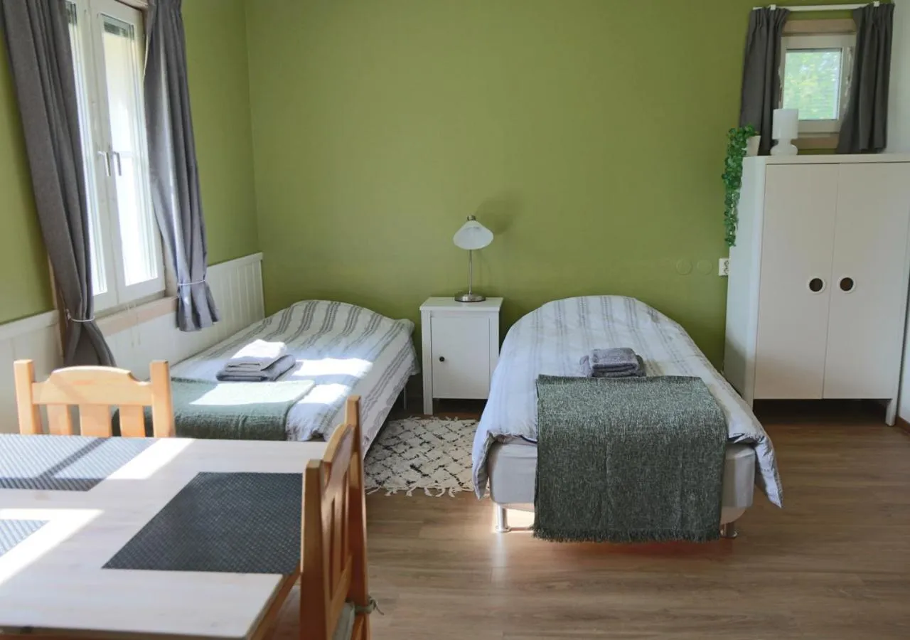 Dining area, Bed in HusHotellHunge AB