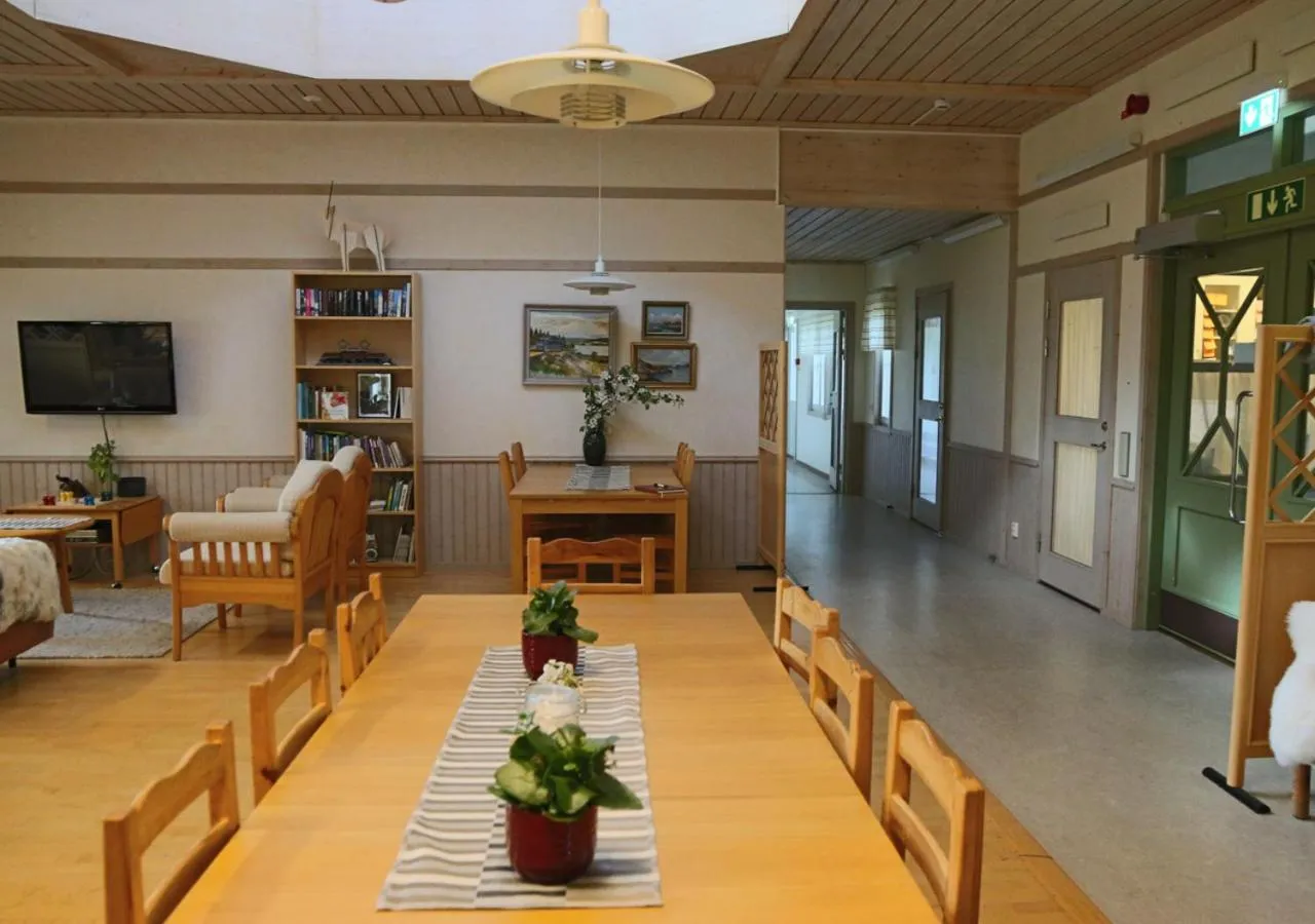 Communal lounge/ TV room in HusHotellHunge AB