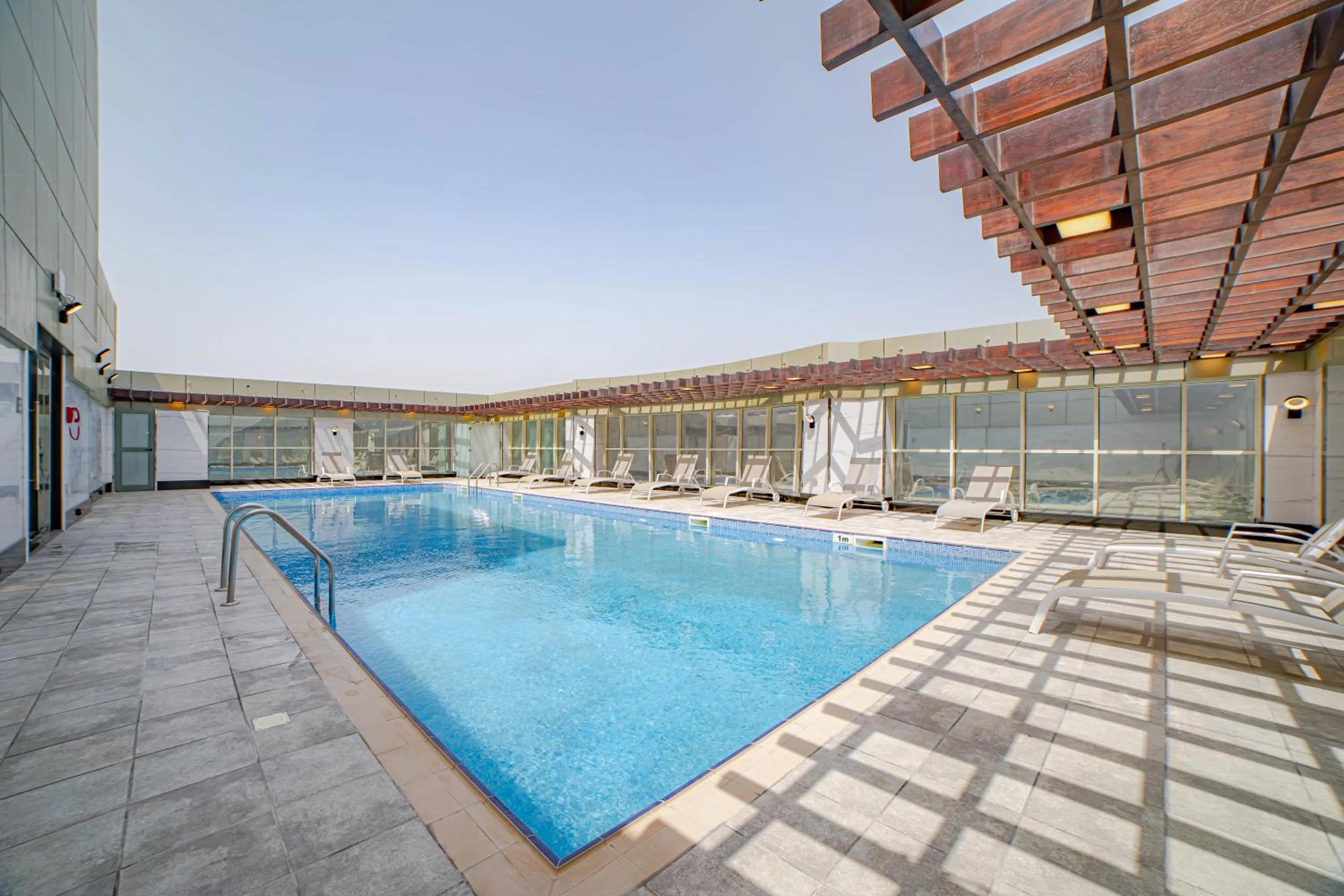 Swimming pool in Platinum Coast Hotel Apartments
