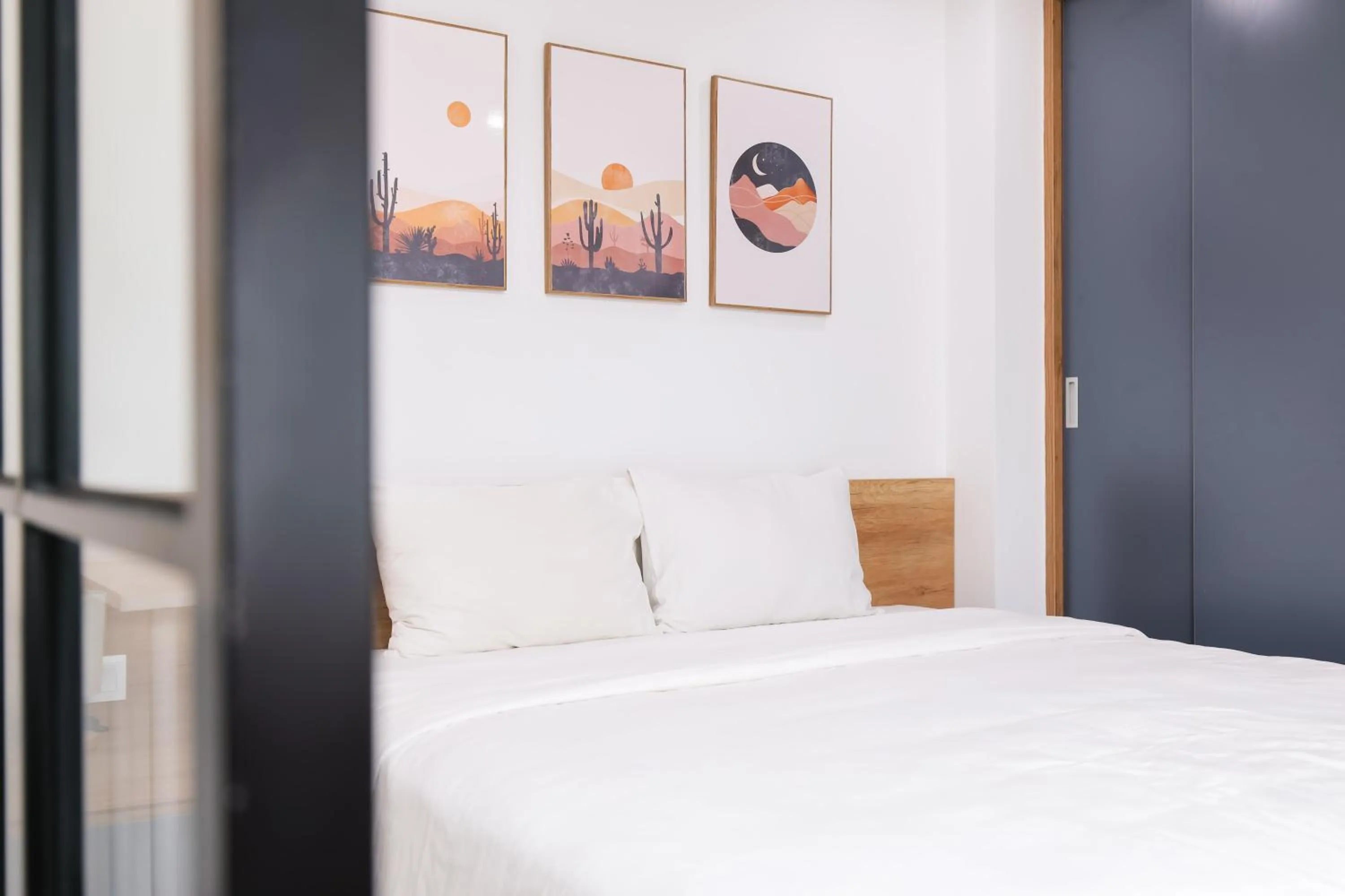 Bed in LAGOM APARTMENT AND HOTEL