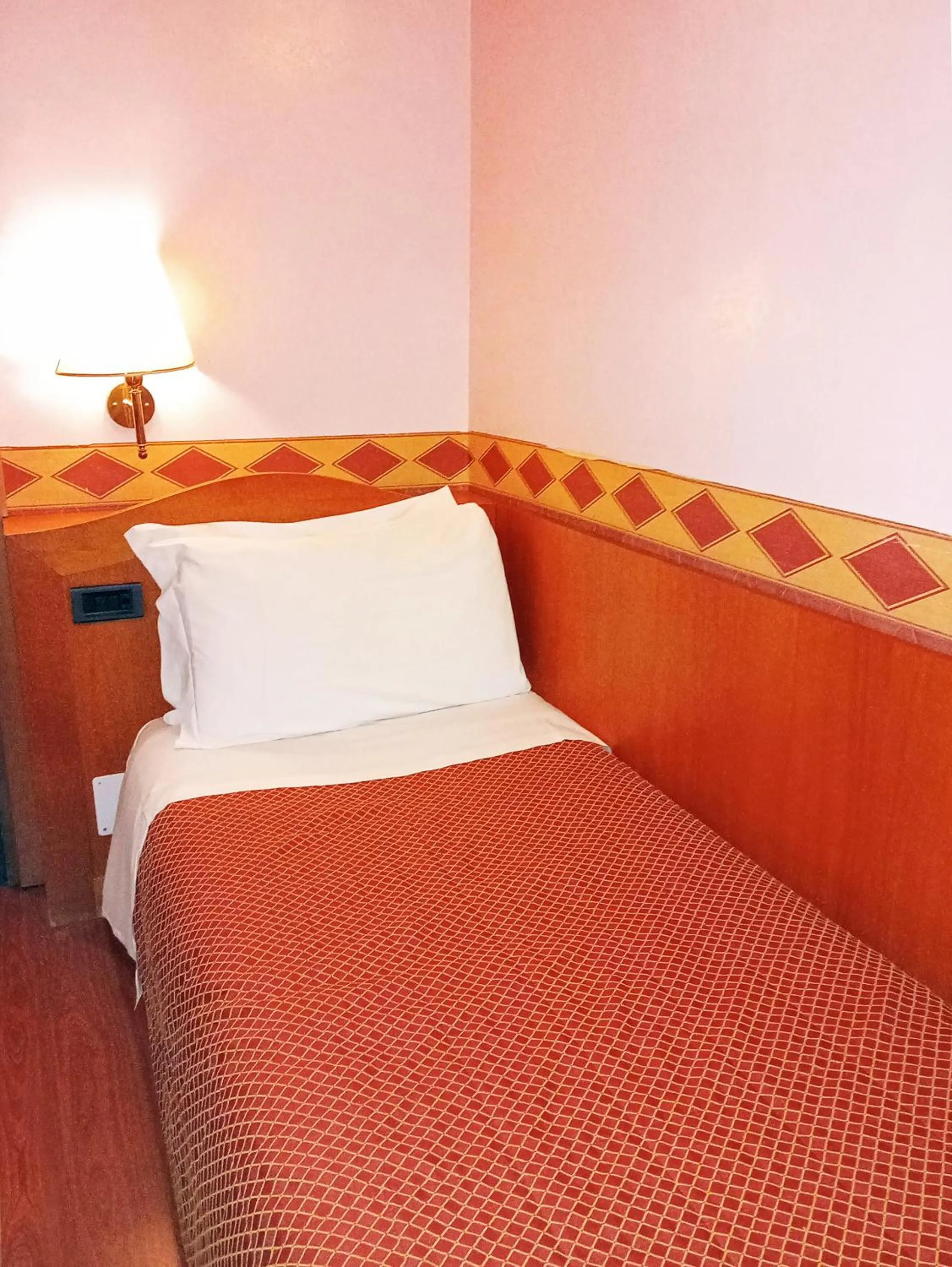 Bed in Hotel Amadeus