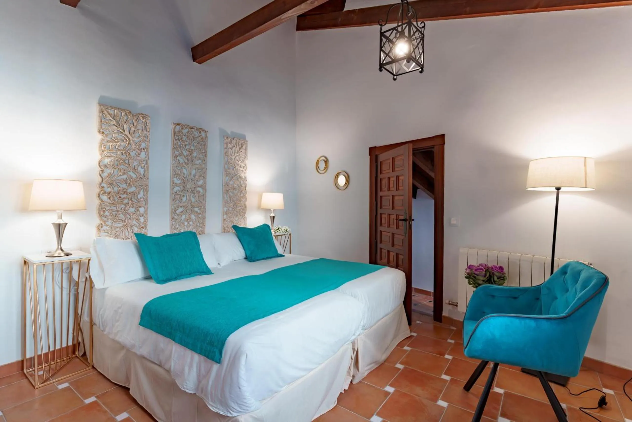 Bed in SUITES CASA DE LAS COLUMNAS