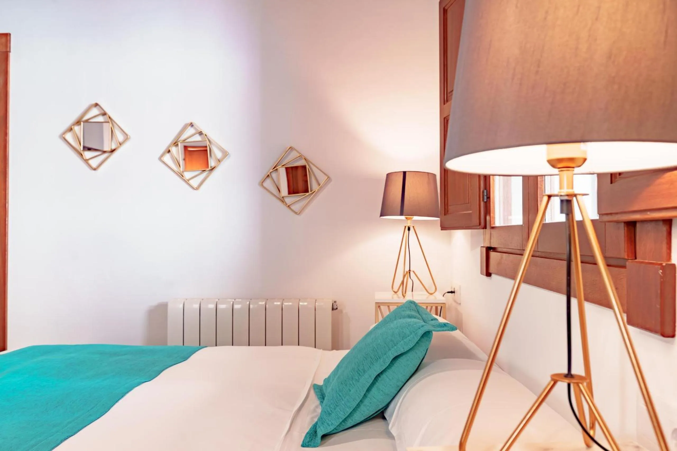 Bed in SUITES CASA DE LAS COLUMNAS