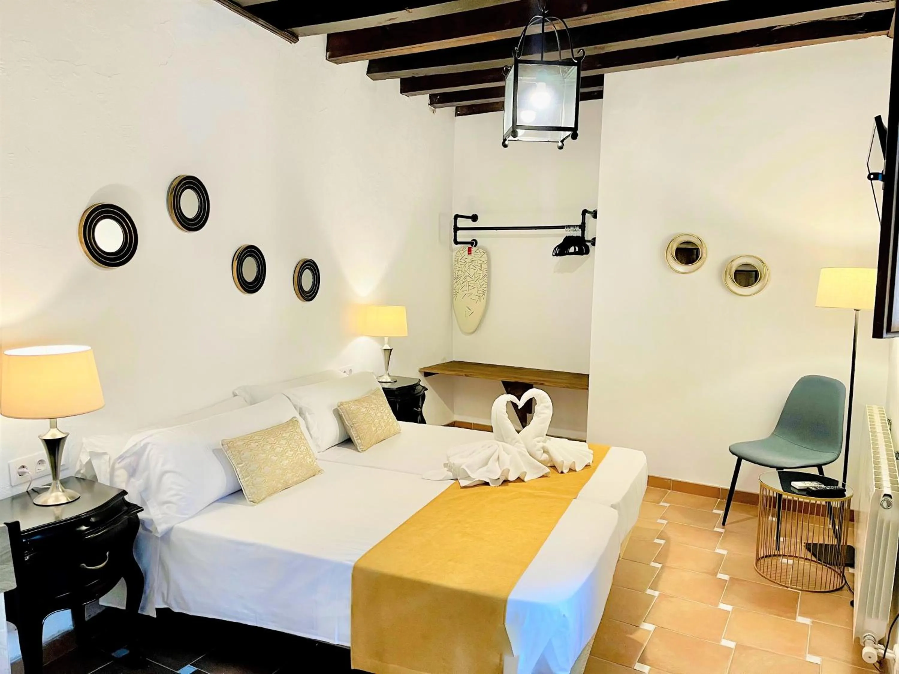 Bed in SUITES CASA DE LAS COLUMNAS