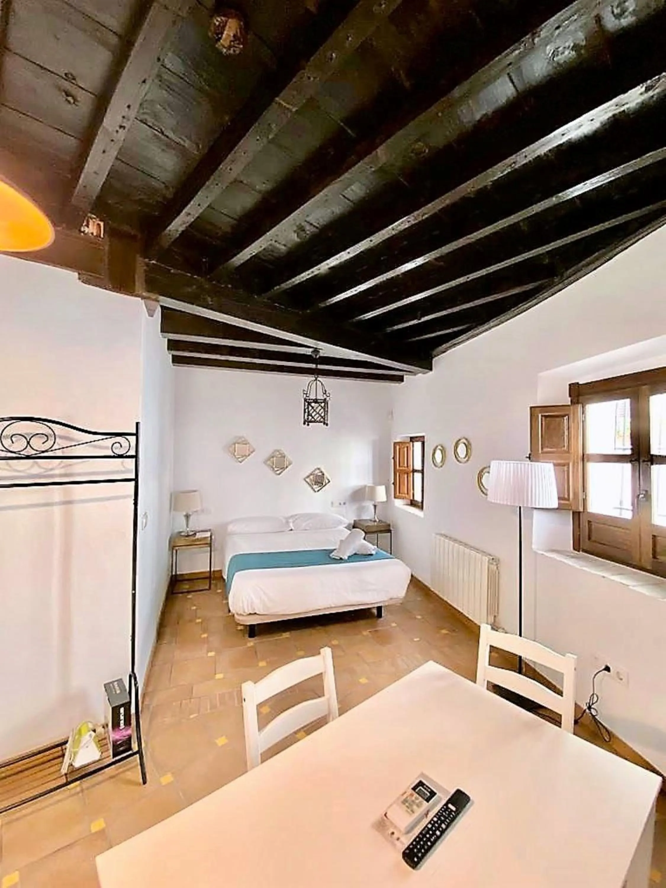 Bed in SUITES CASA DE LAS COLUMNAS