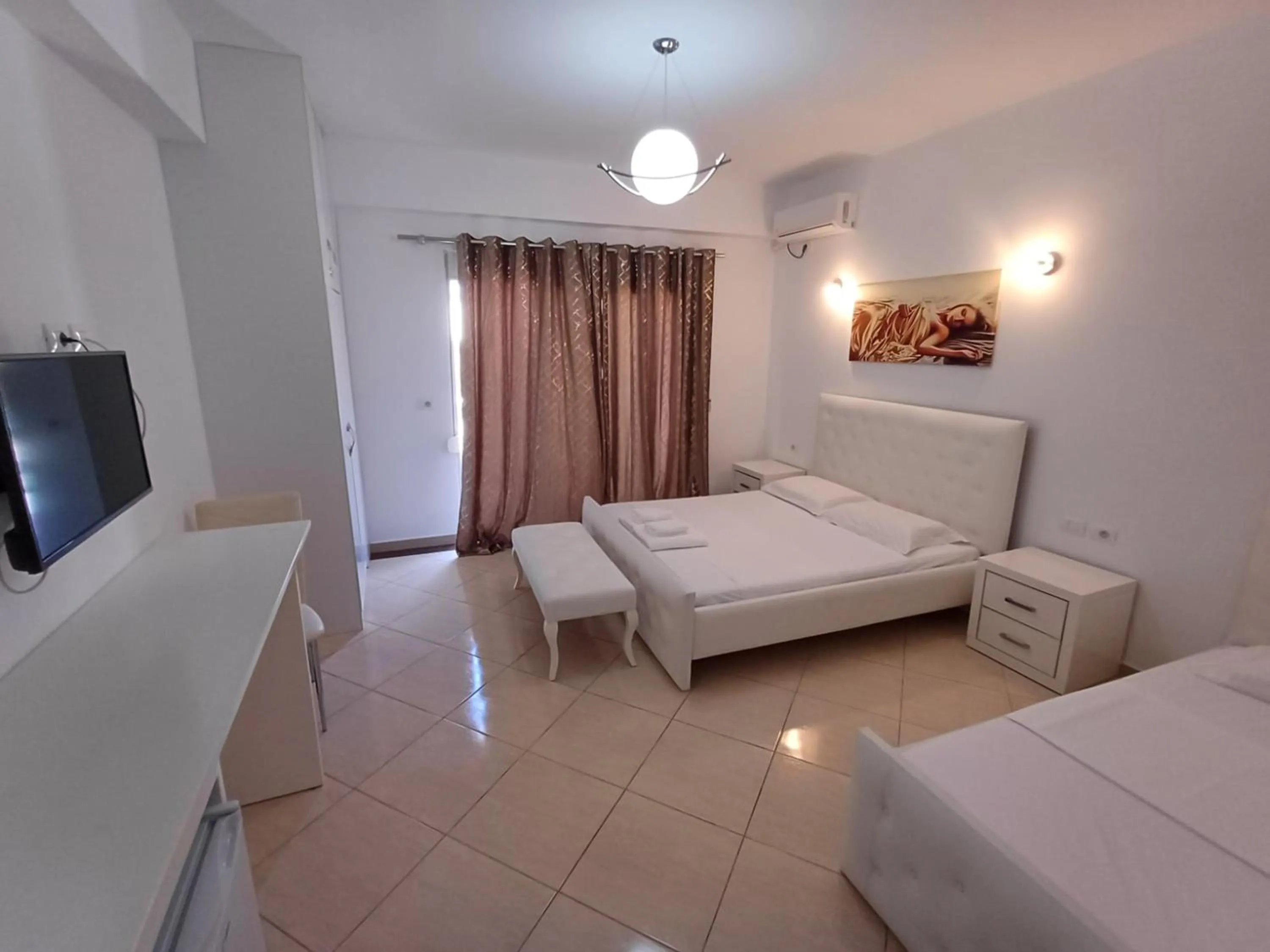 Bed in Hotel Sherifi