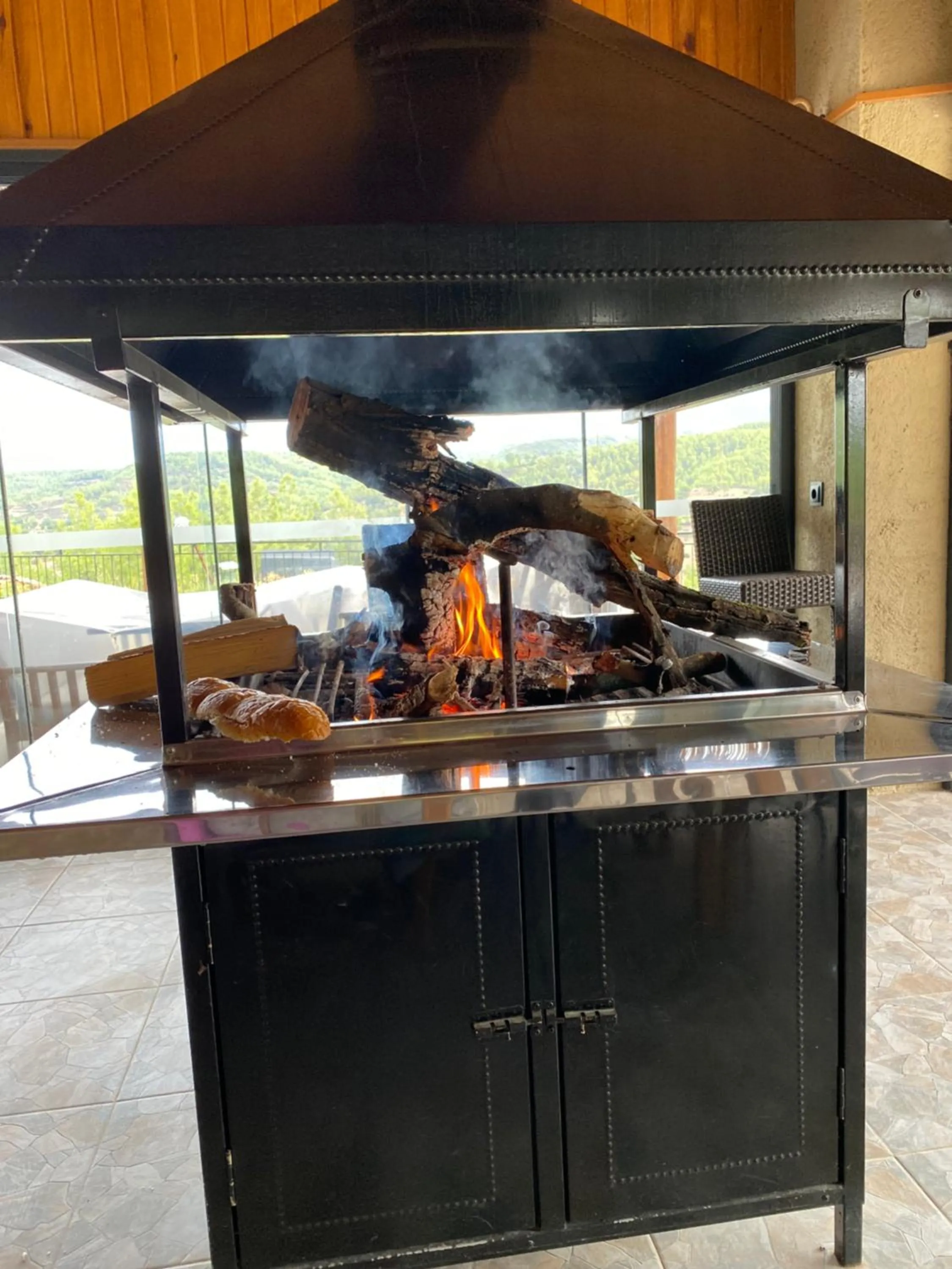 fireplace in Maison Green Hill Hobbit Villas & Boutique Hotel