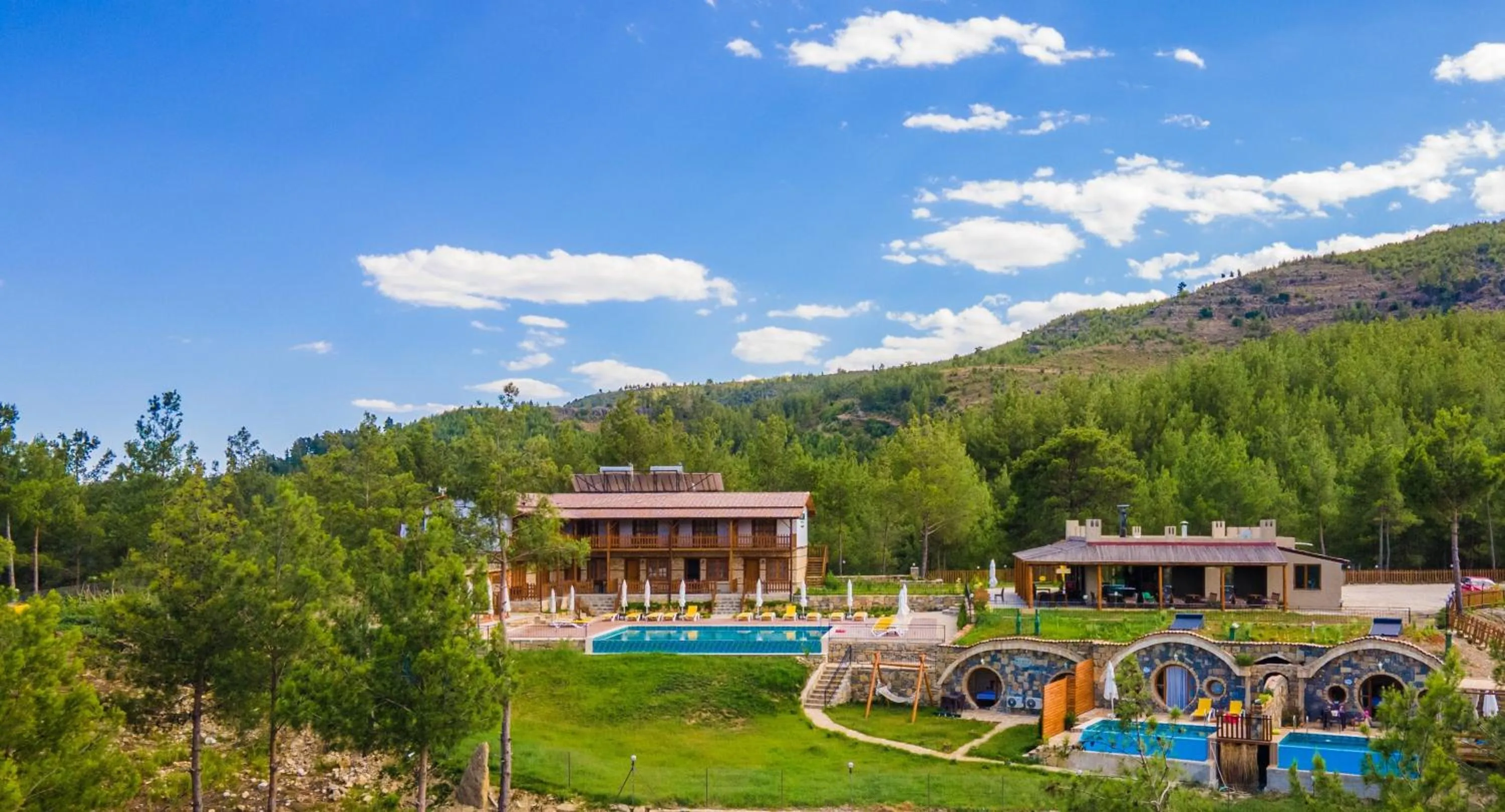 Property building in Maison Green Hill Hobbit Villas & Boutique Hotel