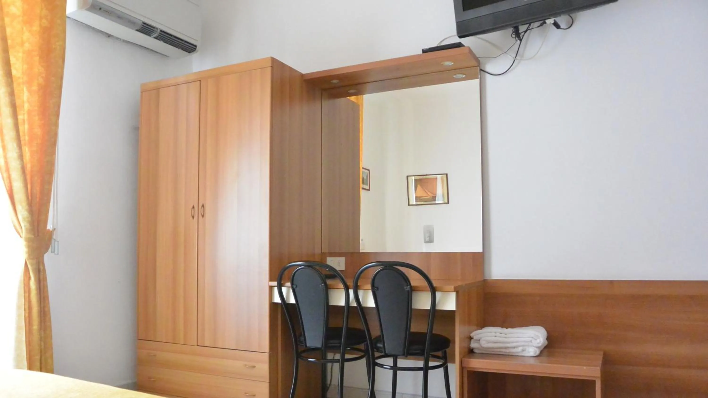 Bedroom in Hotel Mignon