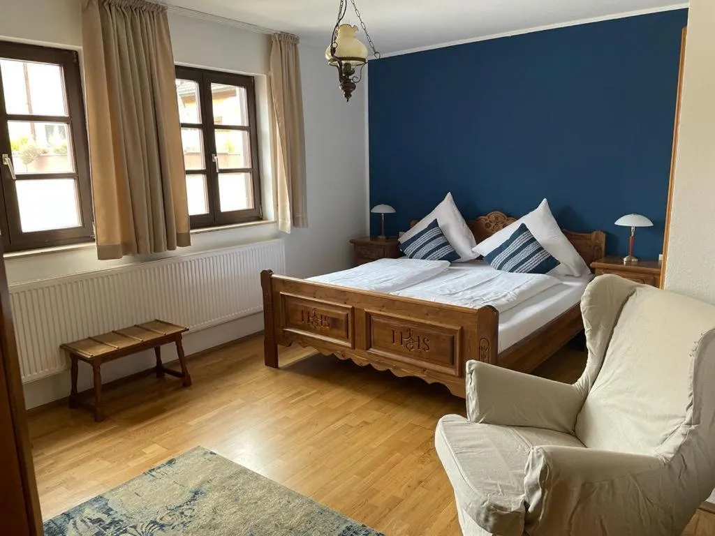 Photo of the whole room, Bed in Hotel und Restaurant Neuhauser