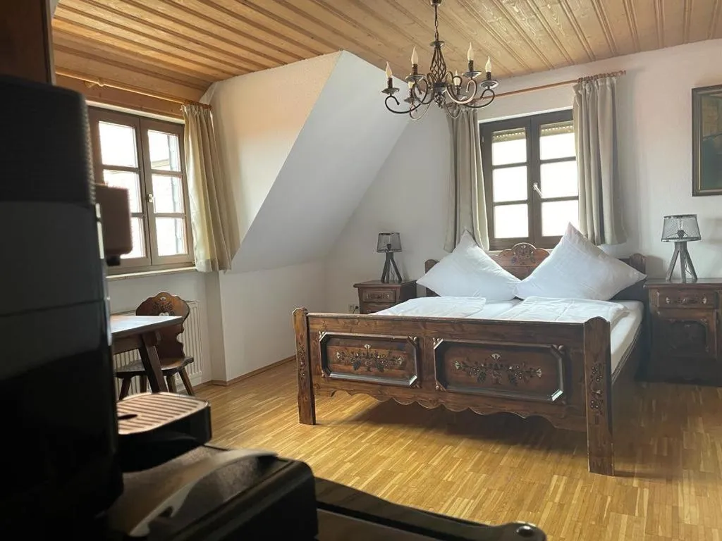 Photo of the whole room, Bed in Hotel und Restaurant Neuhauser