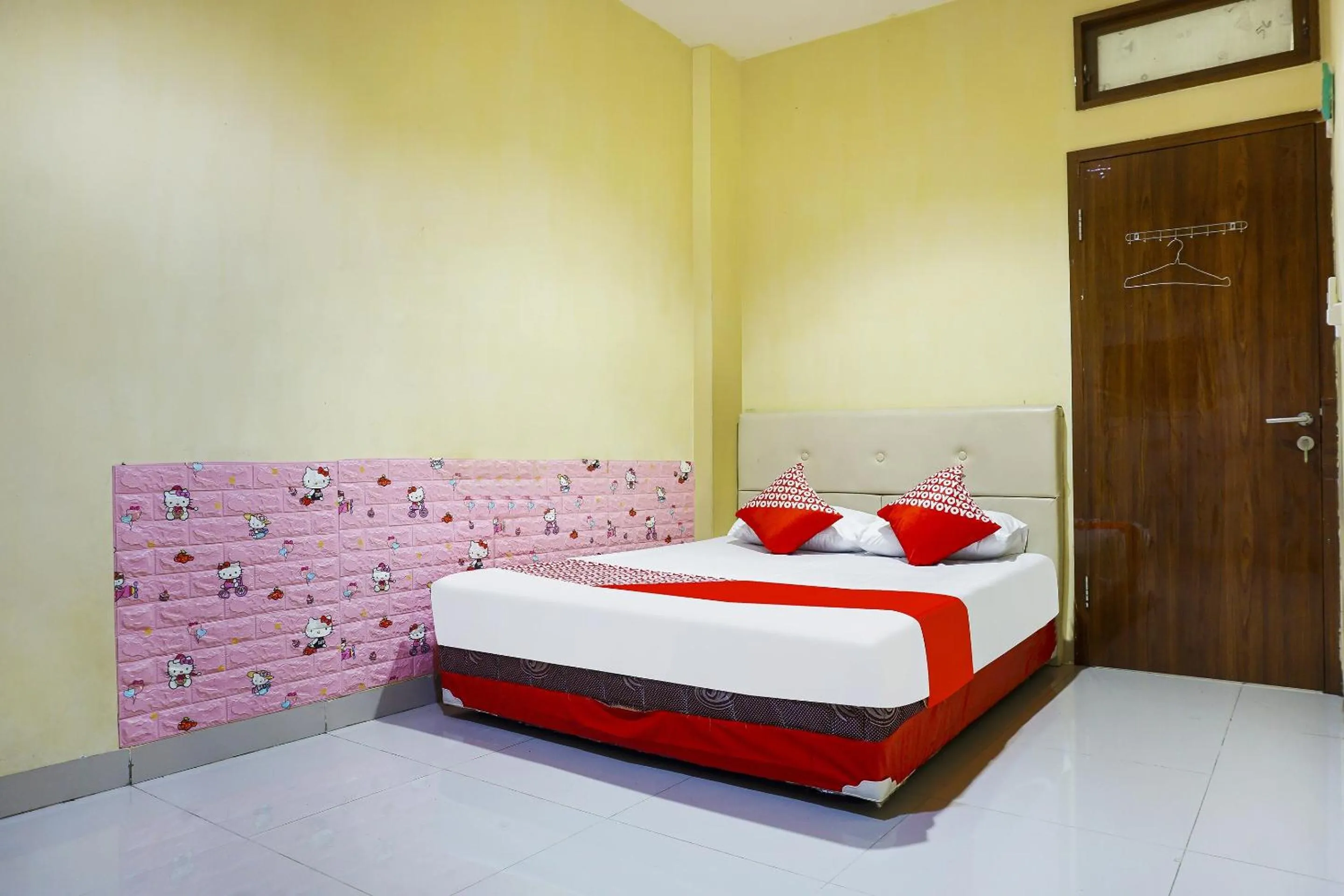 Bedroom in Hotel O Kos'ta Homestay Makassar