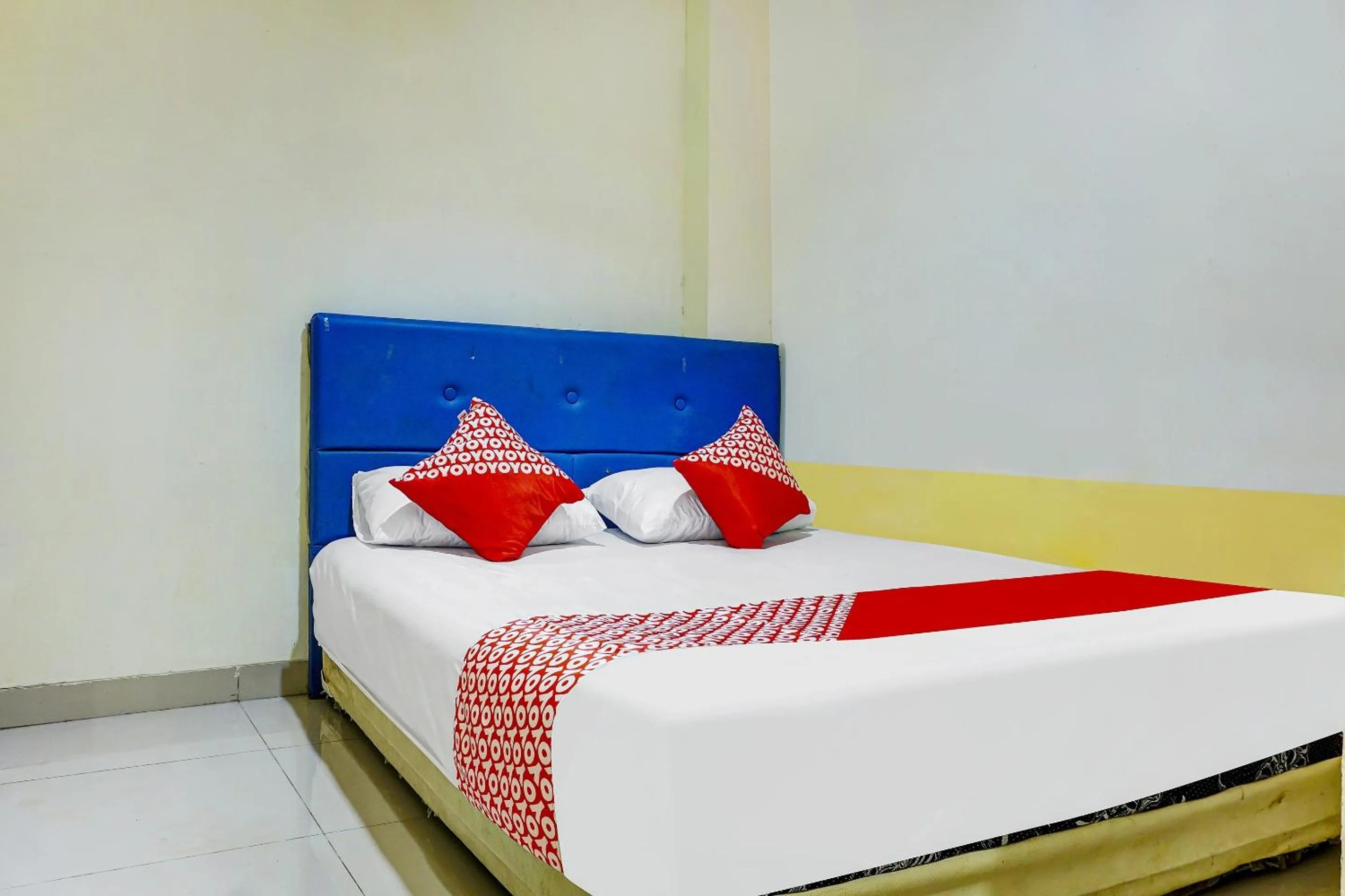 Bedroom in Hotel O Kos'ta Homestay Makassar