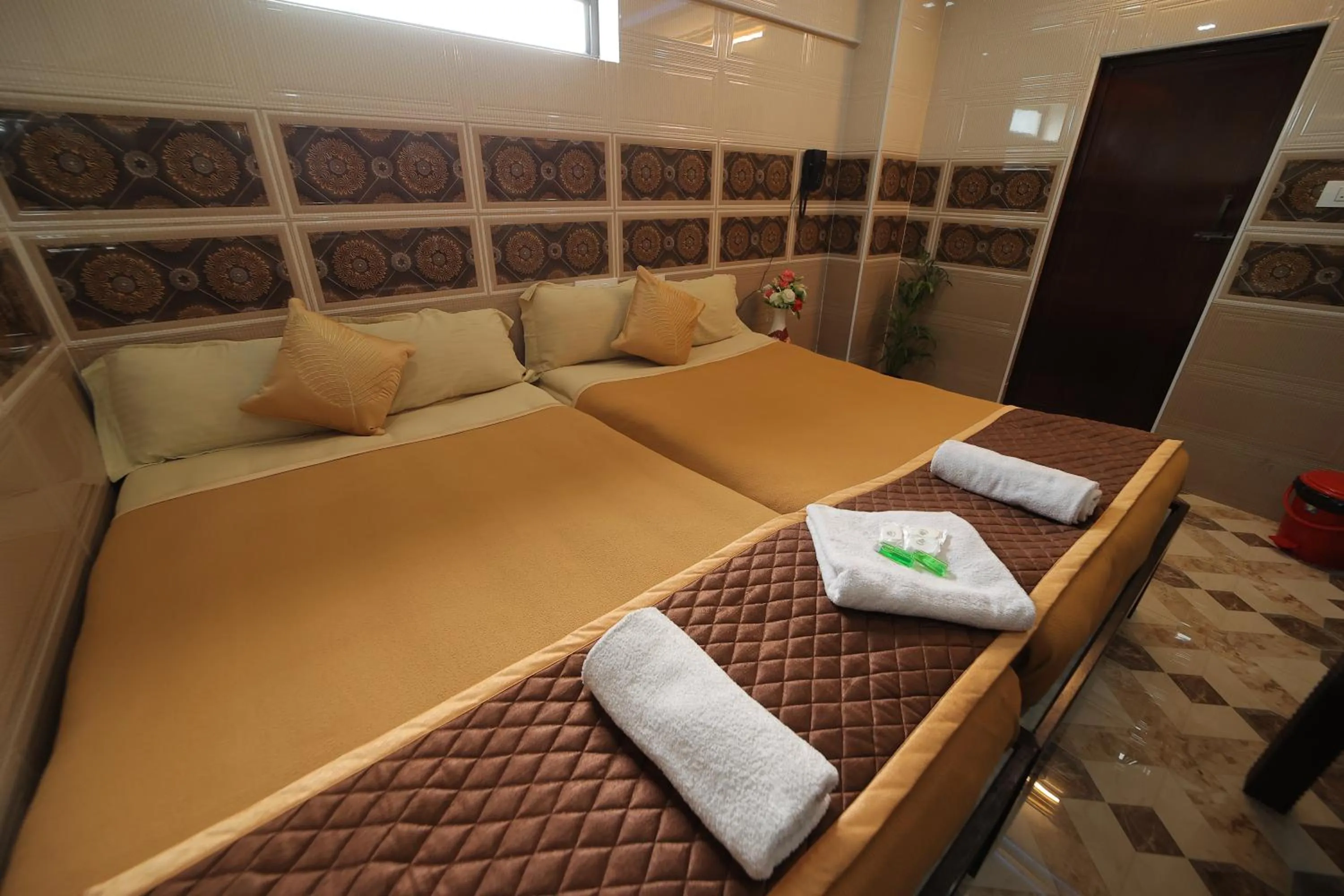 Bed in French Breeze Residency