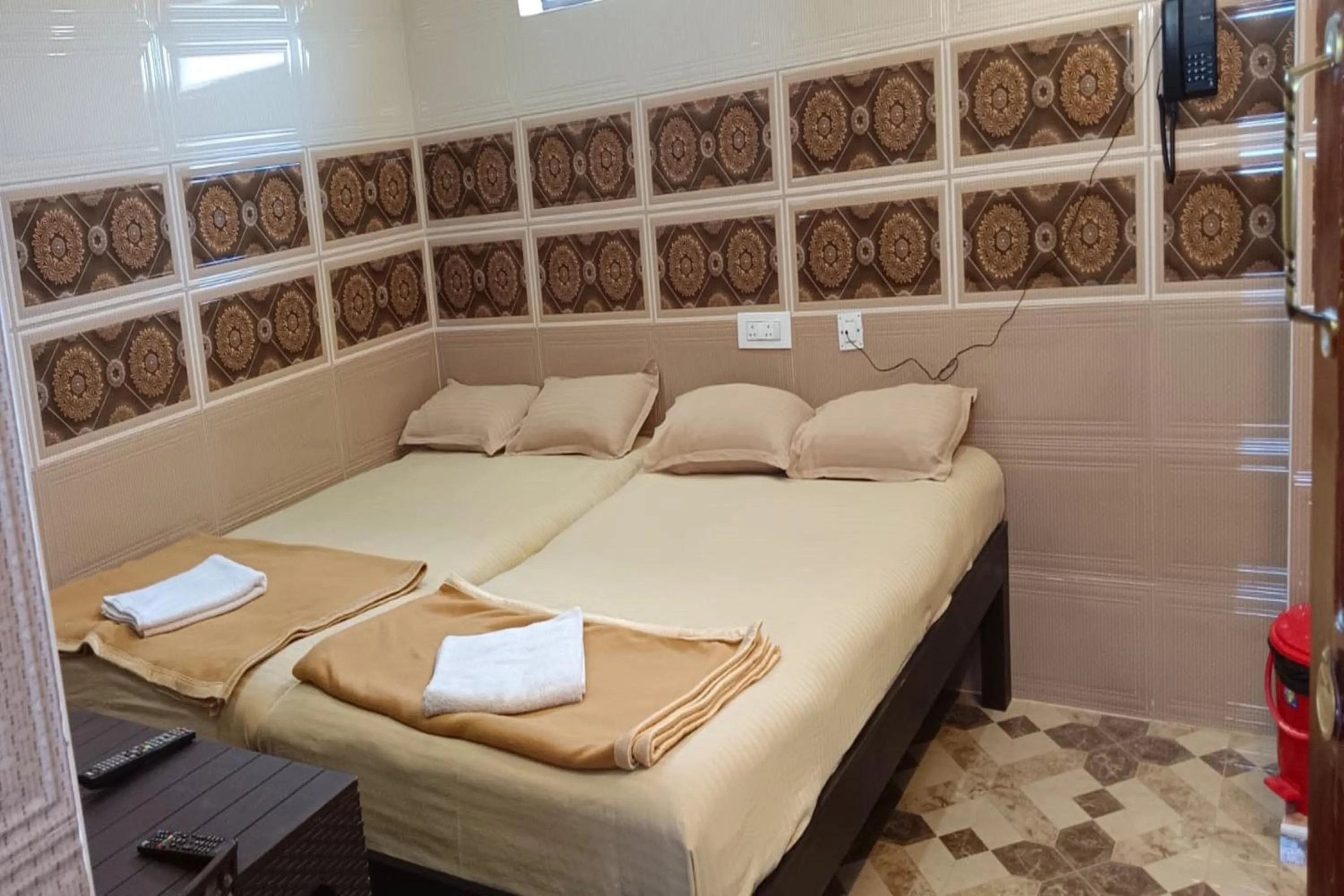 Bed in French Breeze Residency