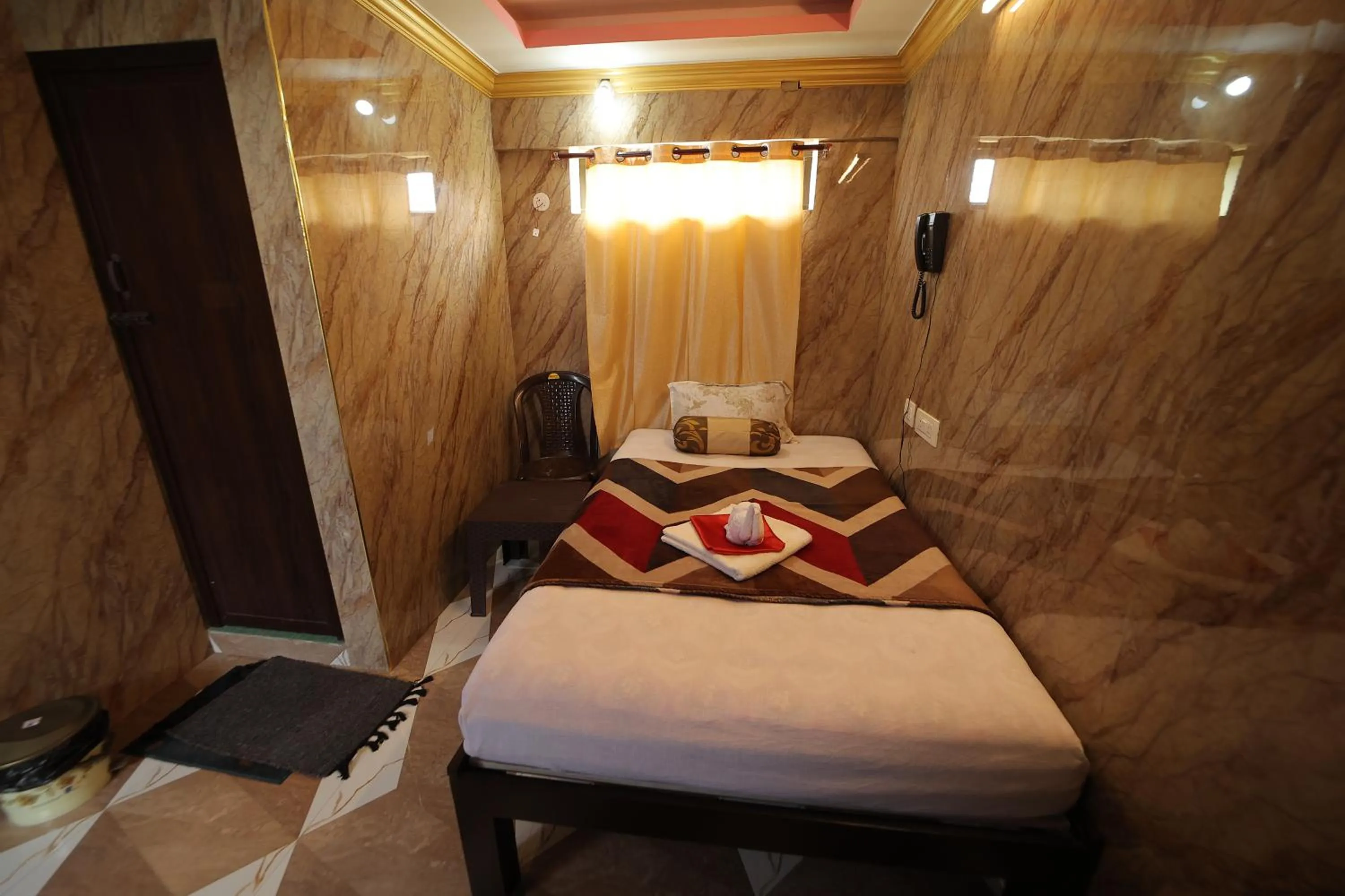 Bedroom in French Breeze Residency