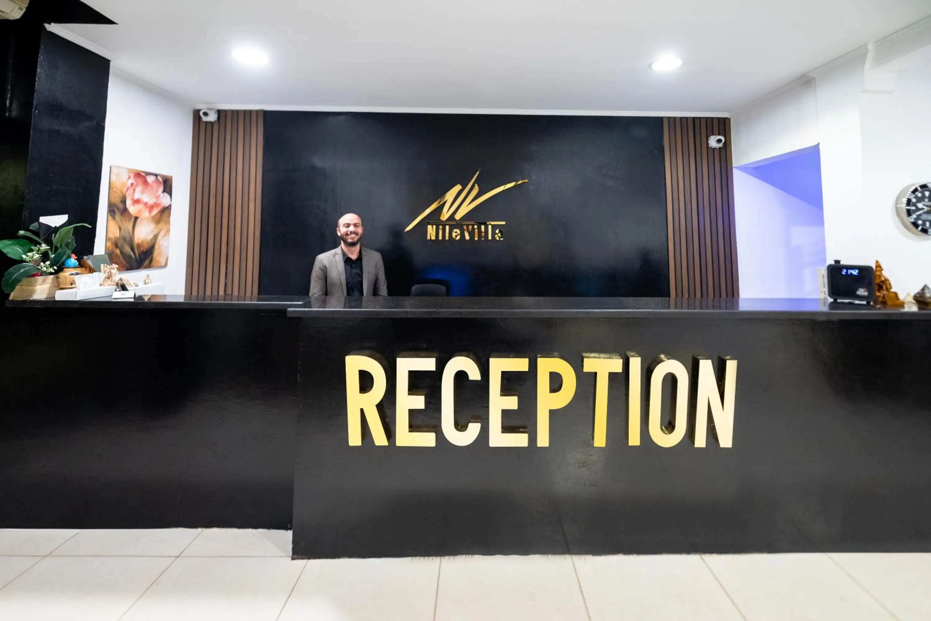 Property logo or sign in Nile Villa Hotel