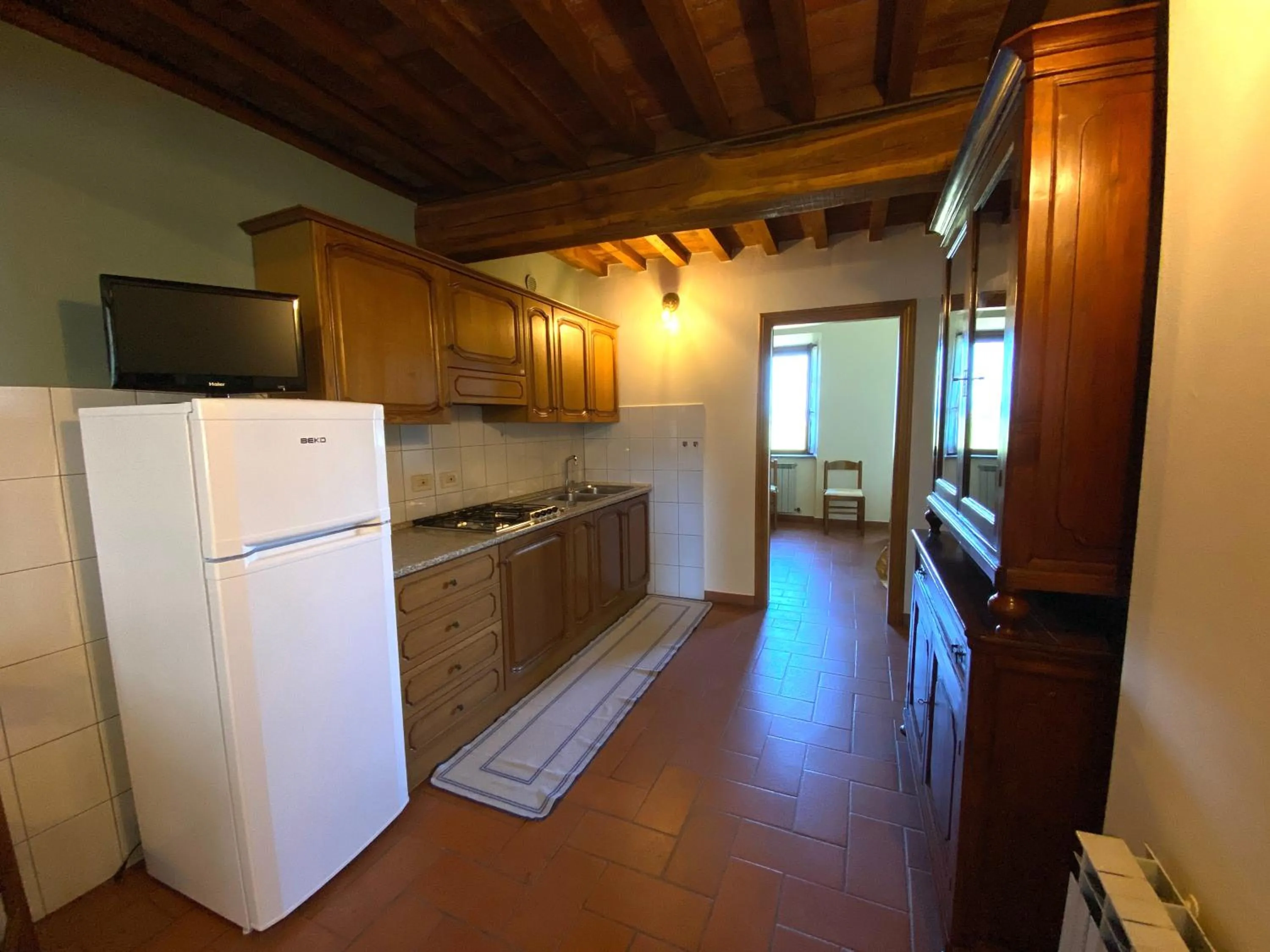 Kitchen or kitchenette in Agriturismo Tenuta Badia