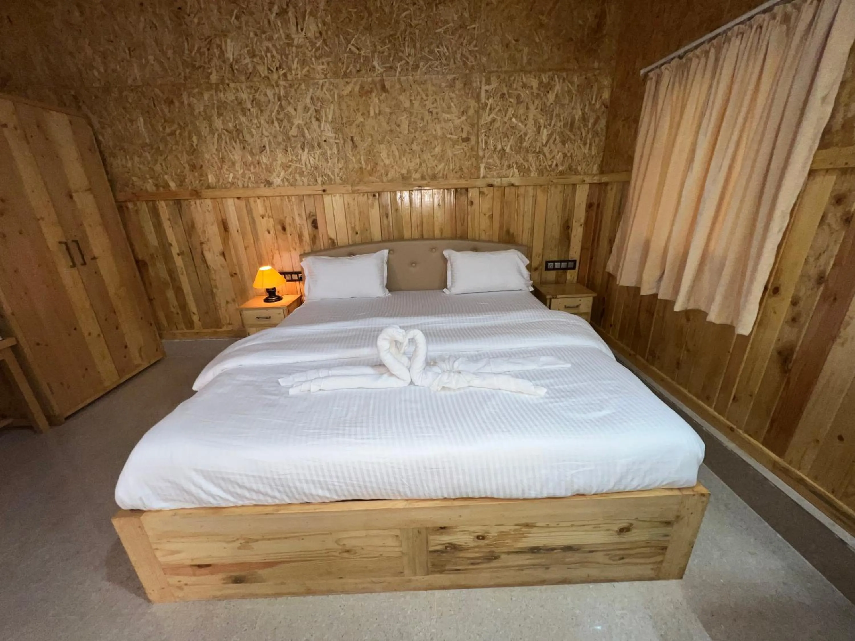 Bed in santanas wooden cottages
