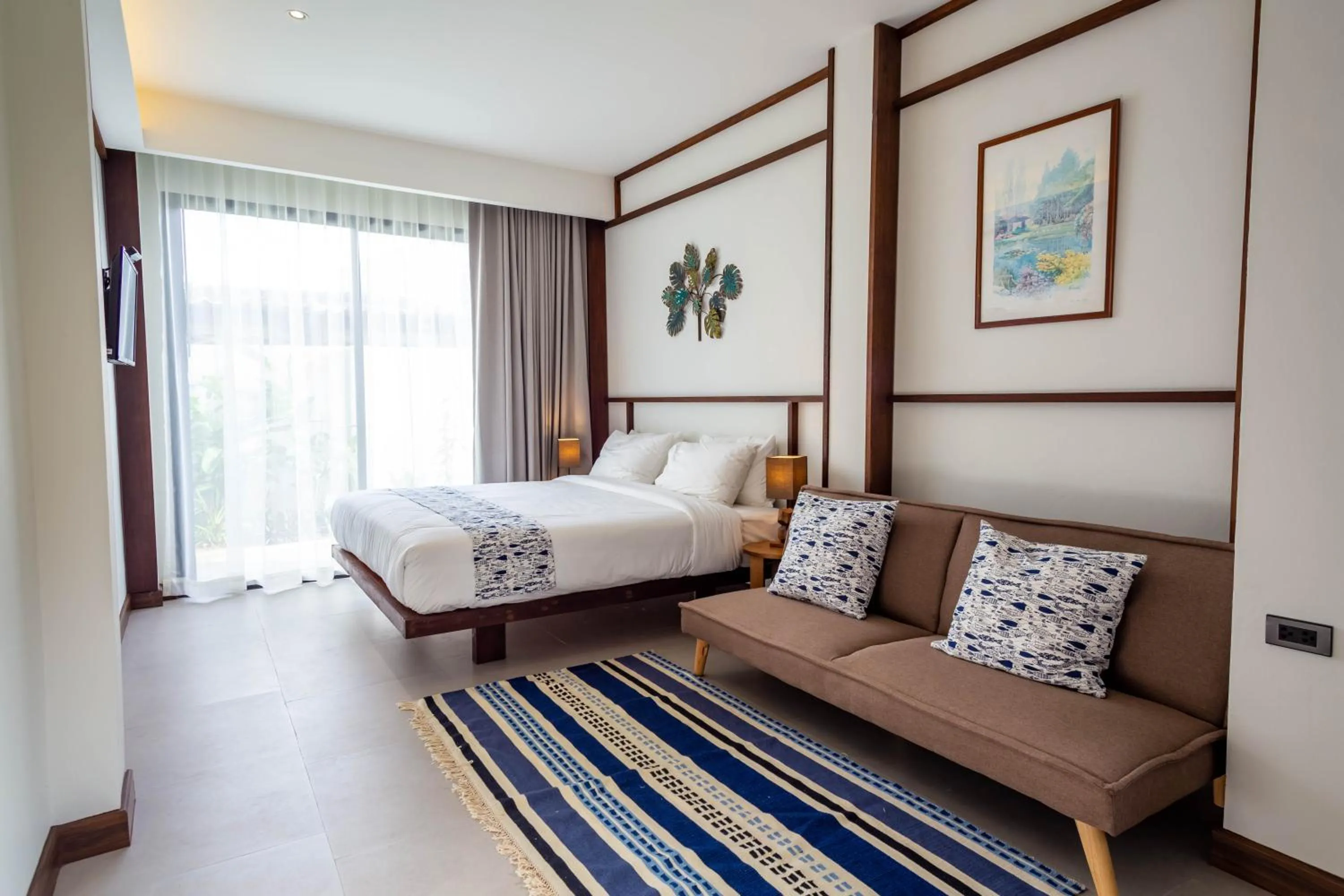 Bed in Baan Kamana Guest House