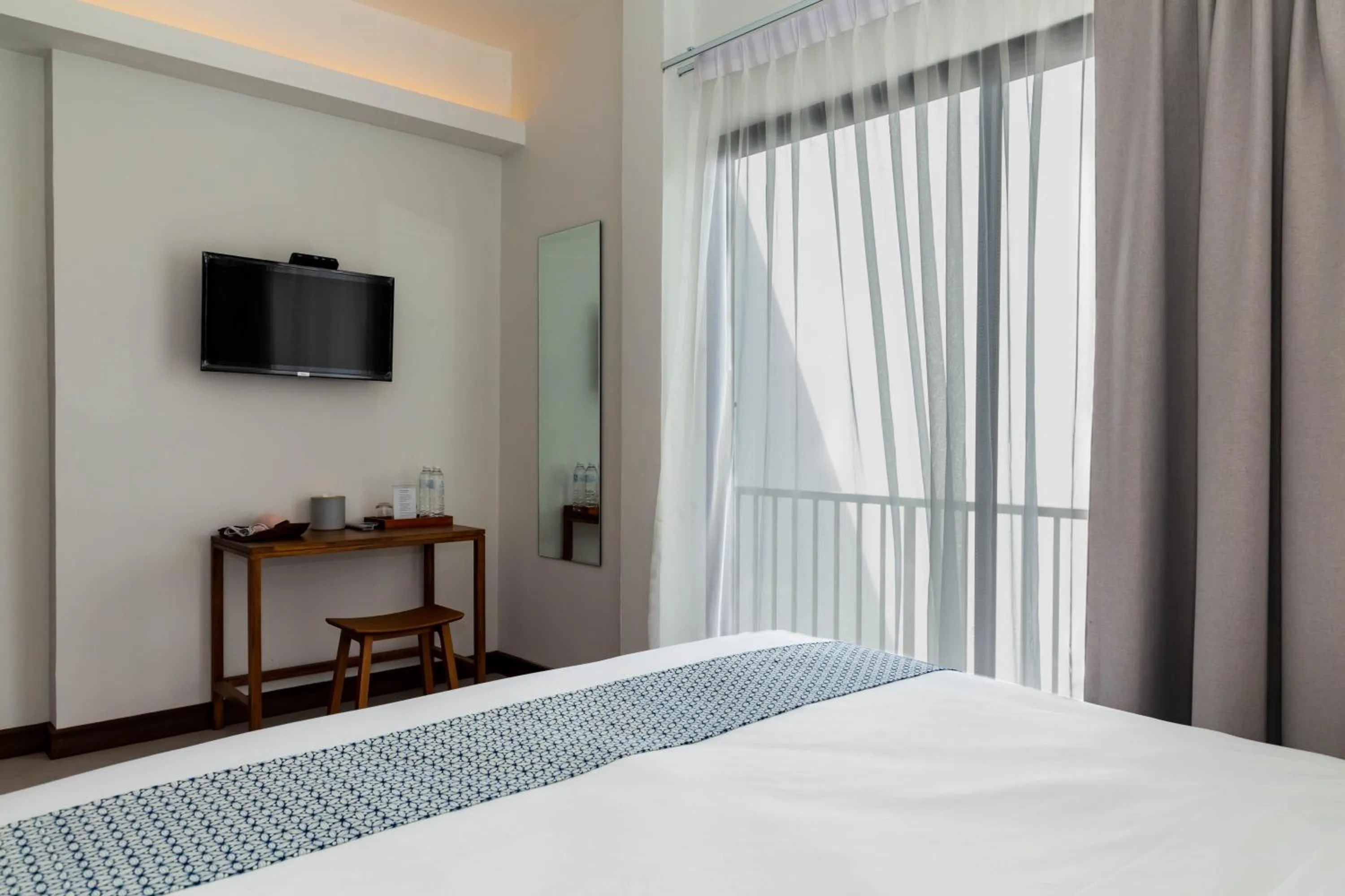 Bed in Baan Kamana Guest House