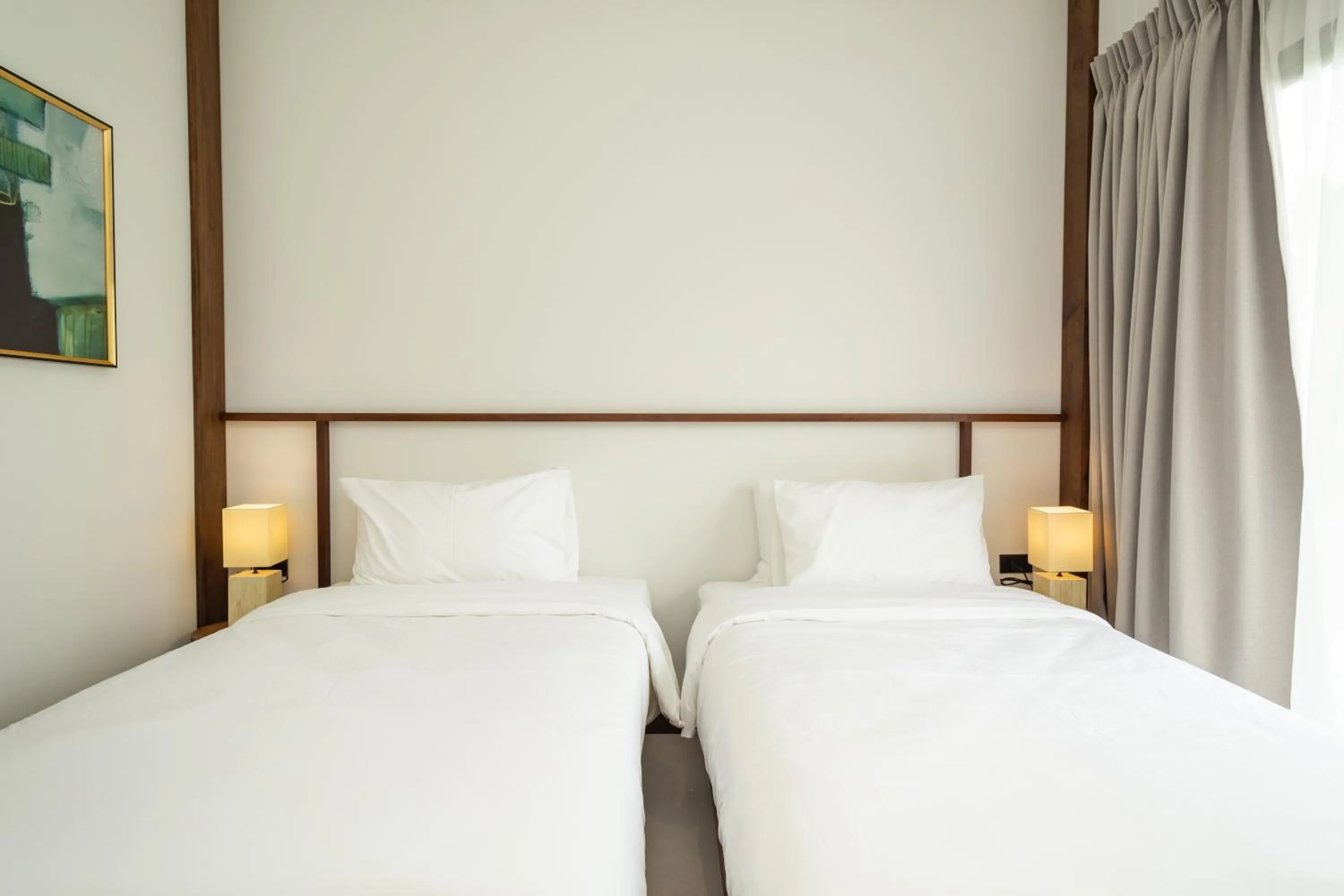 Bed in Baan Kamana Guest House