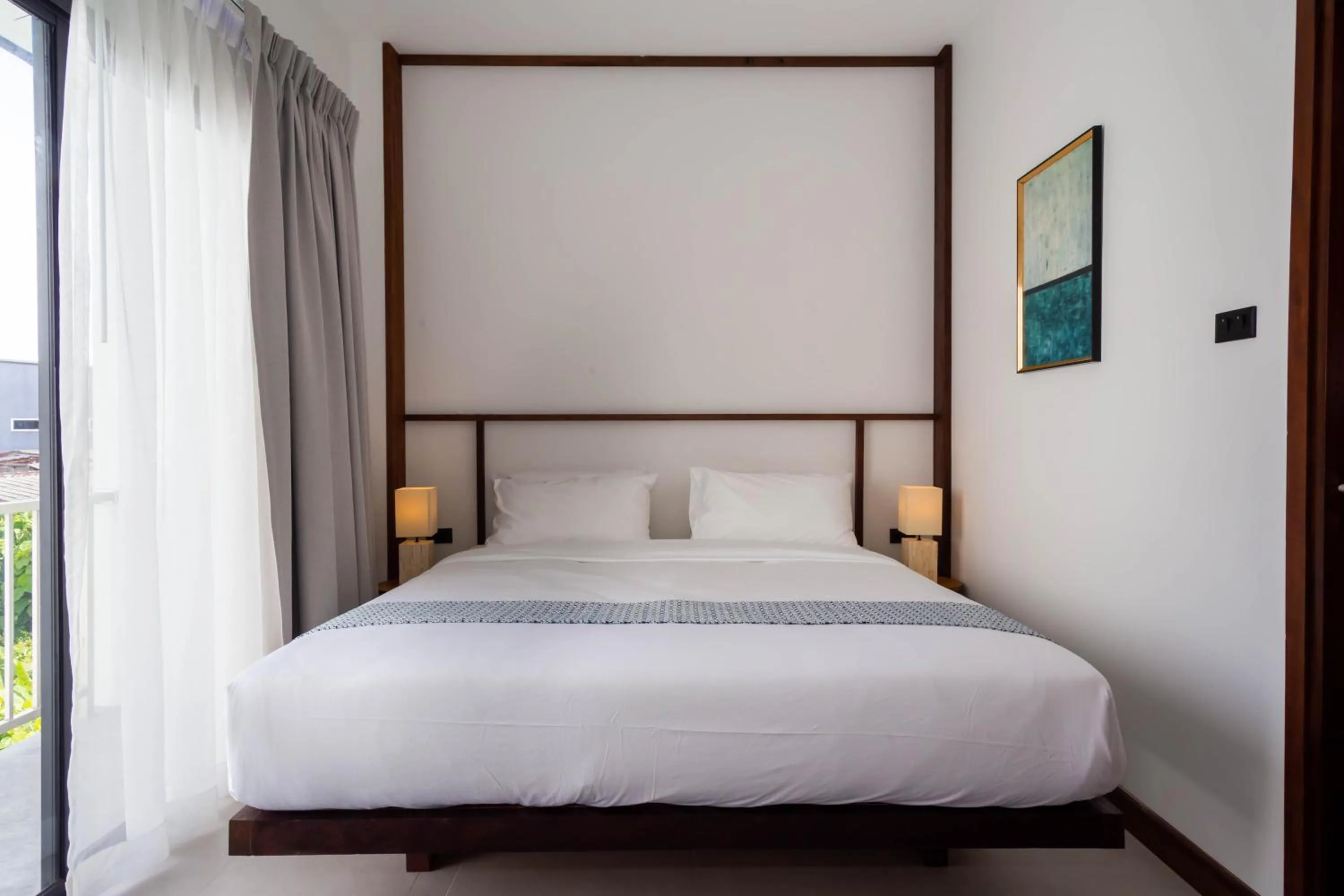 Bed in Baan Kamana Guest House