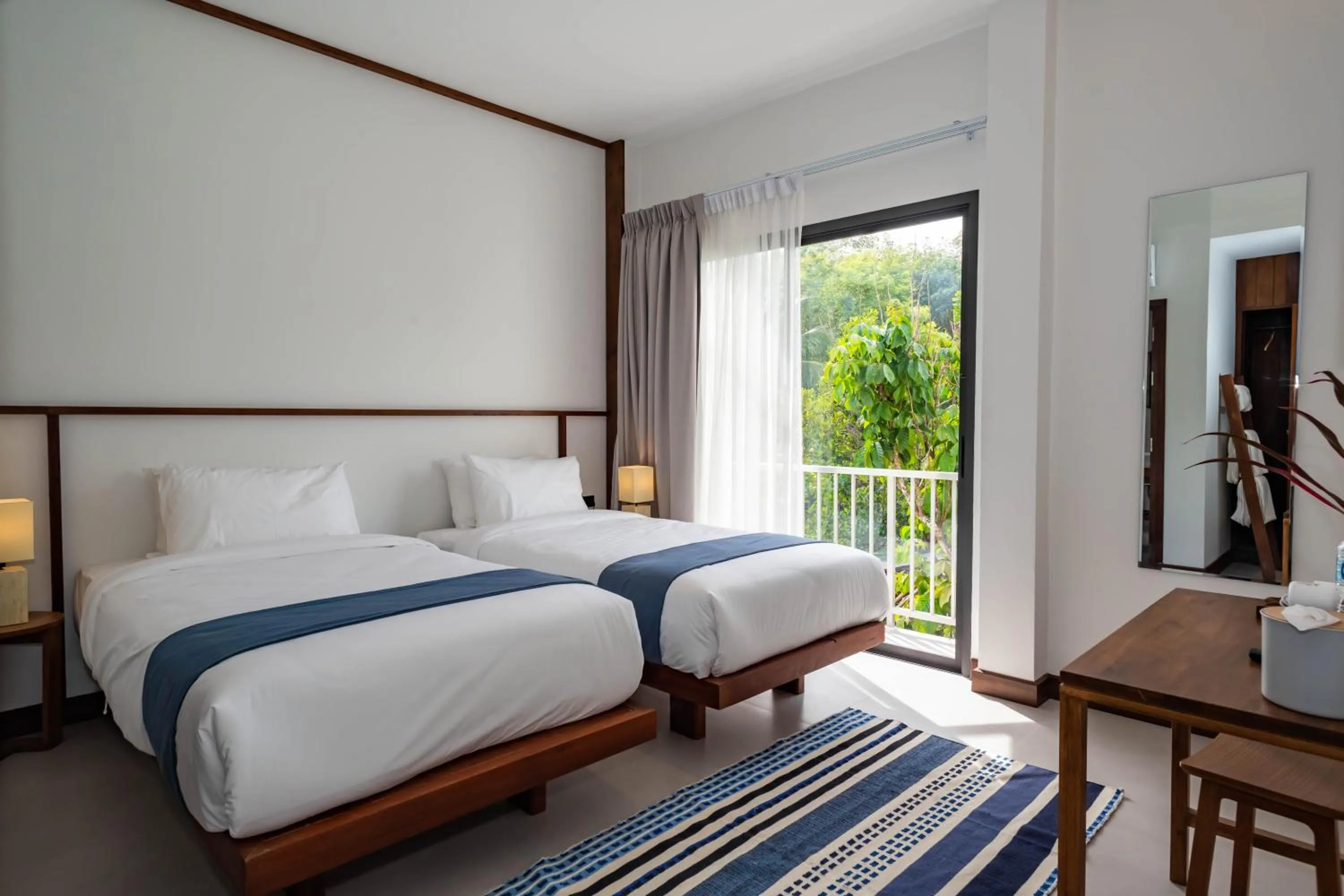 Bed in Baan Kamana Guest House