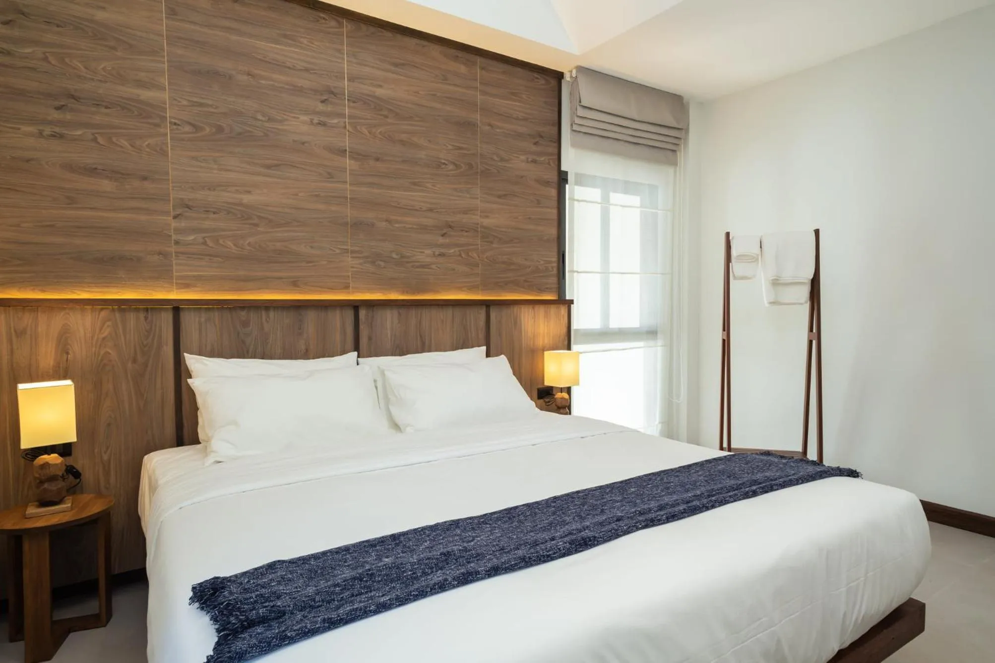 Bed in Baan Kamana Guest House