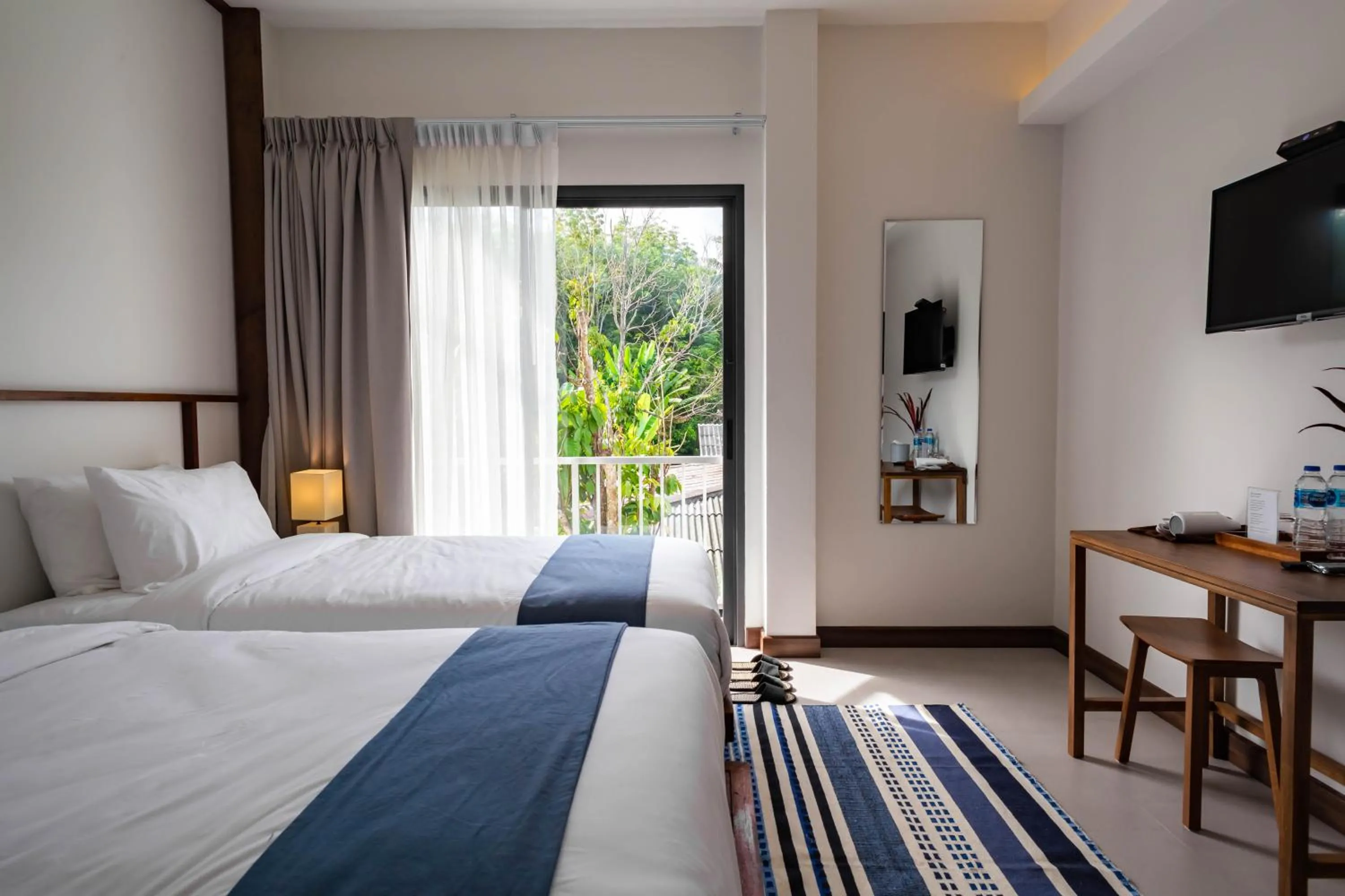 Bed in Baan Kamana Guest House