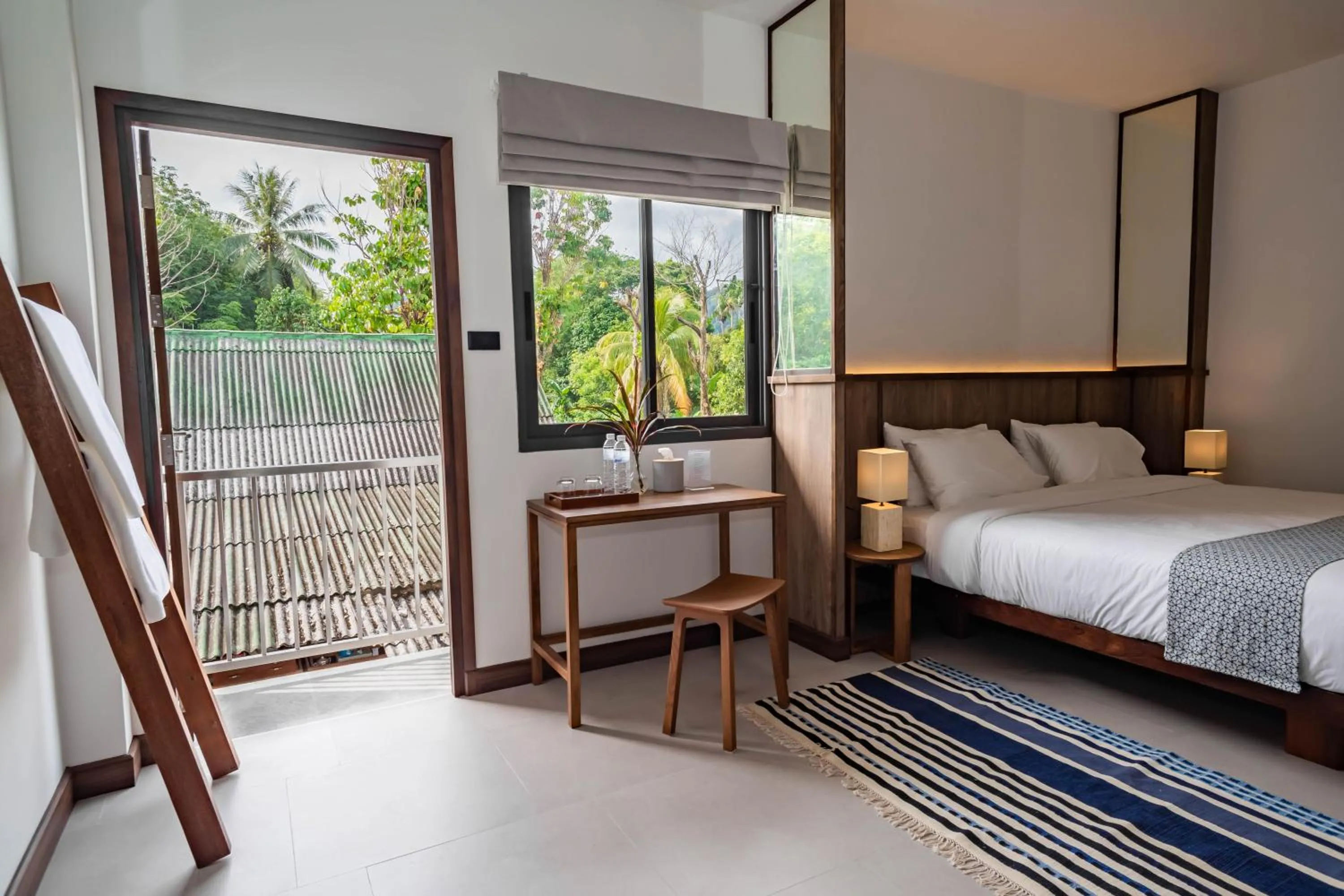 Bed in Baan Kamana Guest House