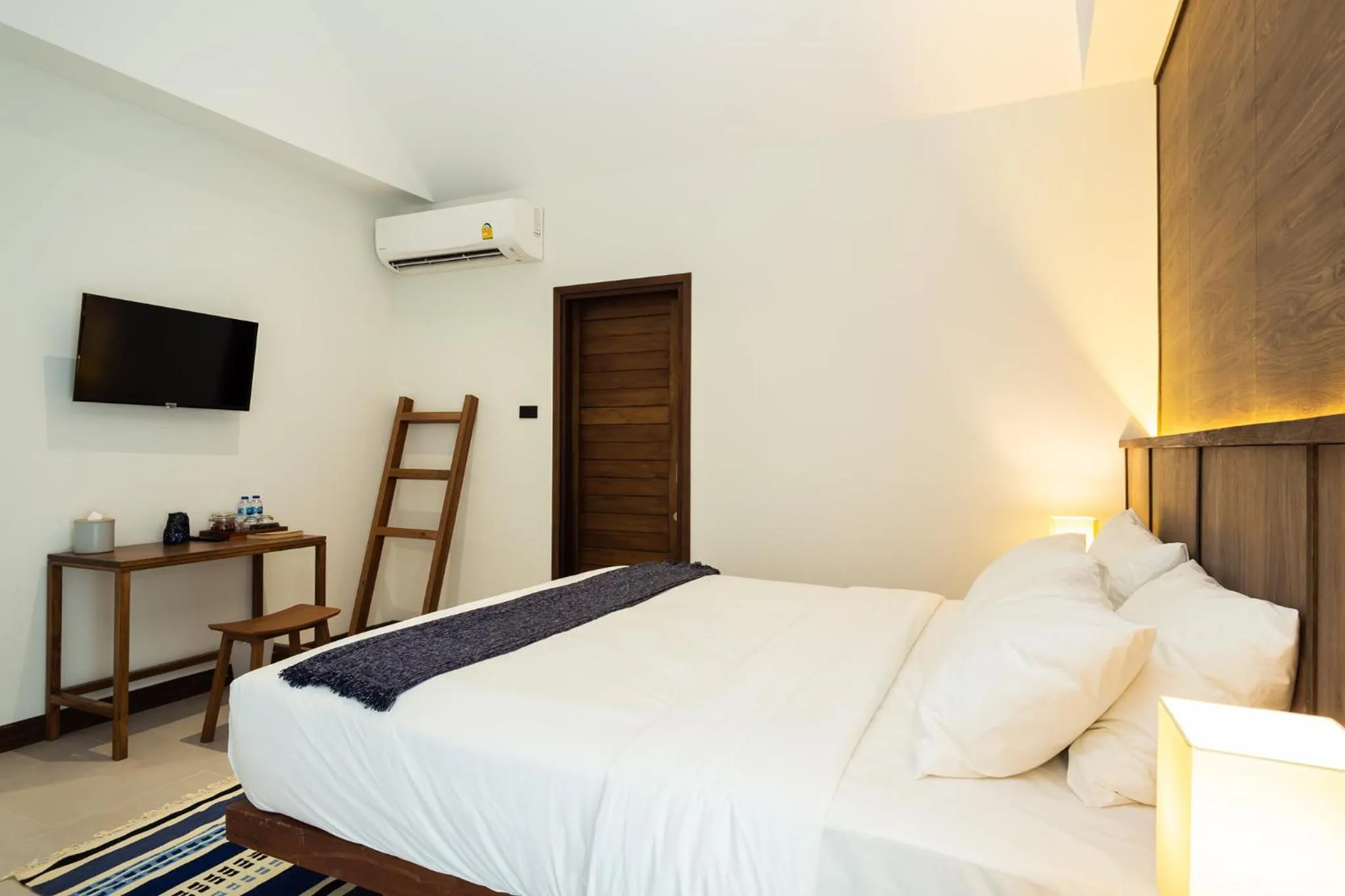 Bed in Baan Kamana Guest House