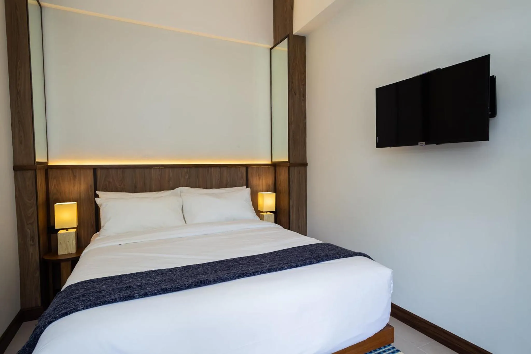 Bed in Baan Kamana Guest House