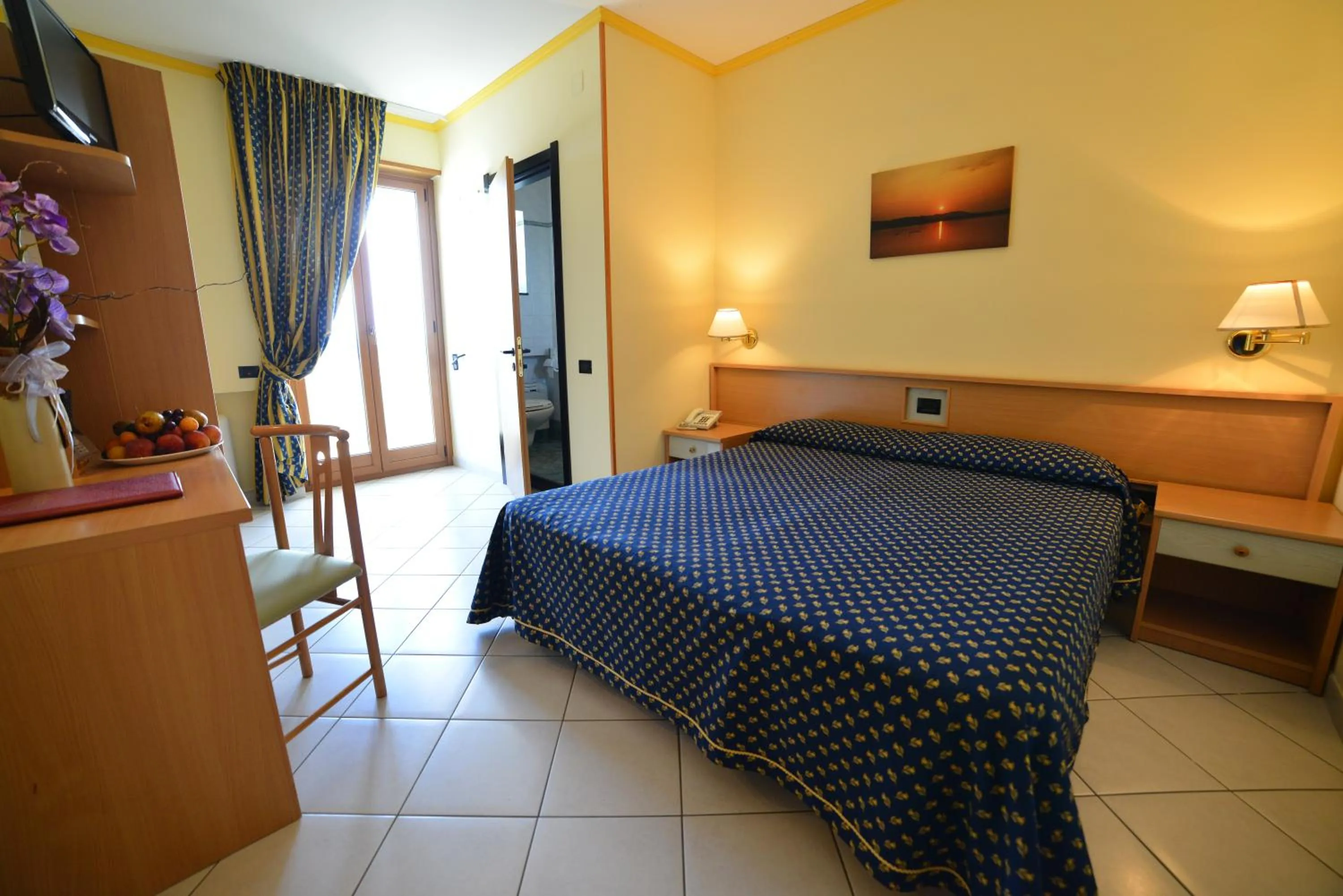 Bed in Hotel Lo Smeraldo