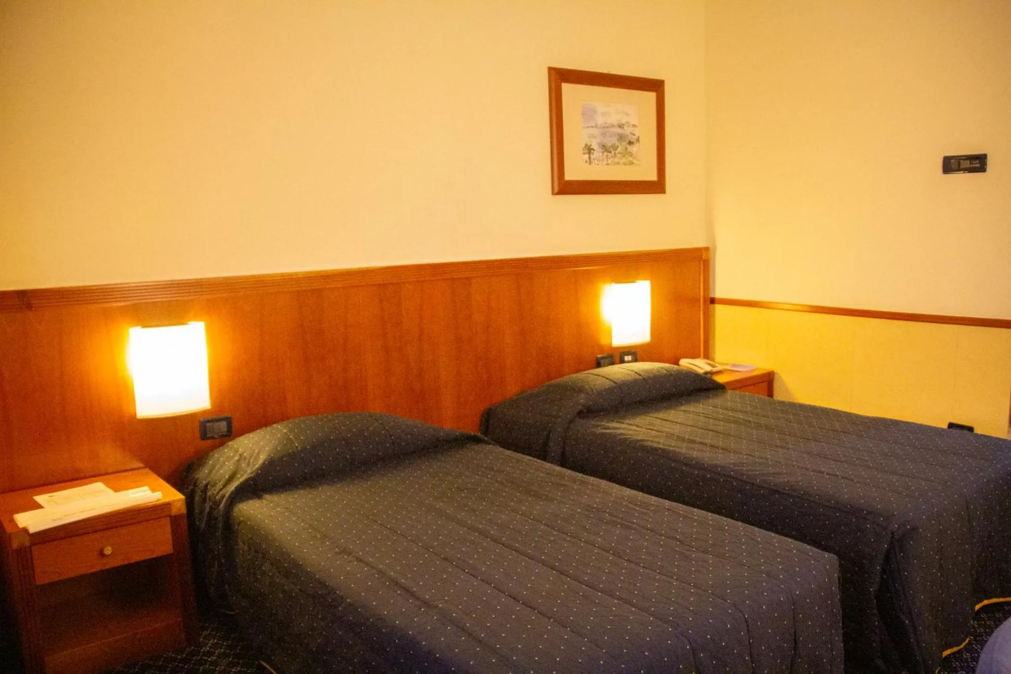 Bed in Pacific Hotel Fortino