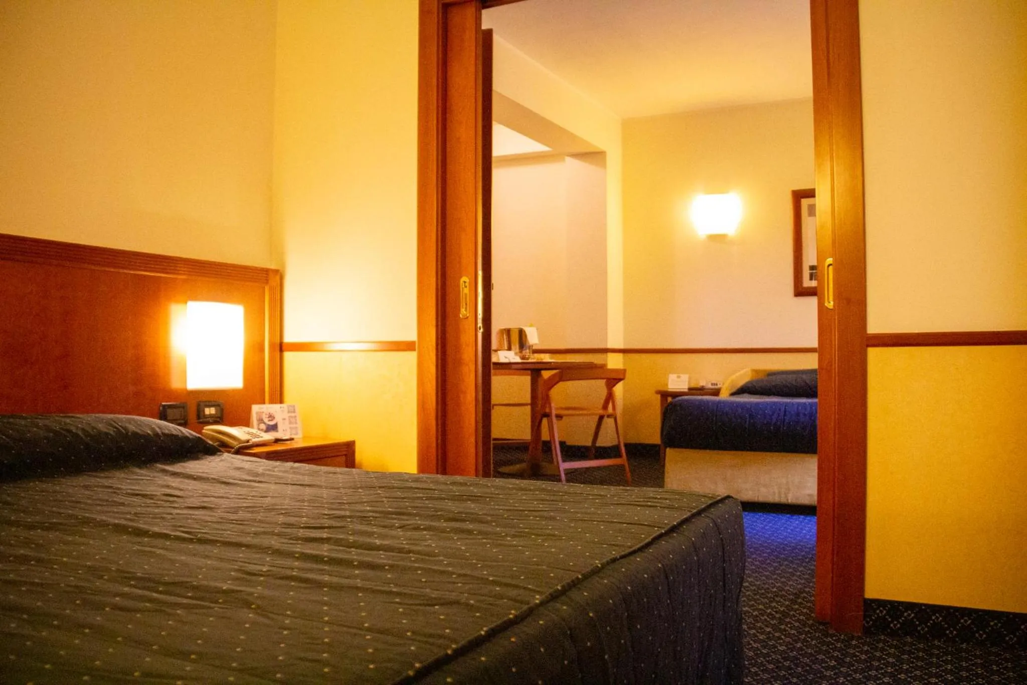 Bed in Pacific Hotel Fortino