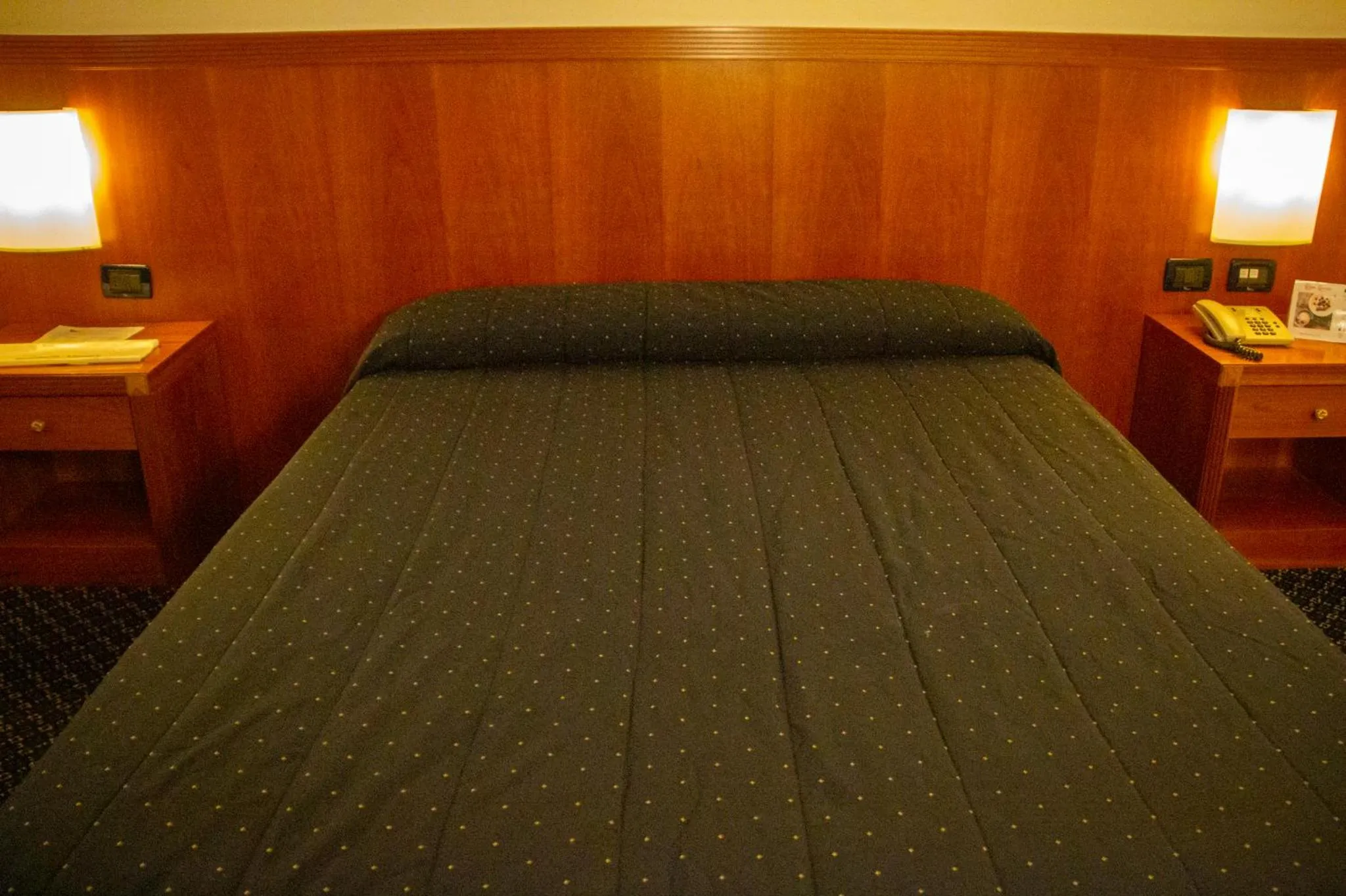 Bed in Pacific Hotel Fortino