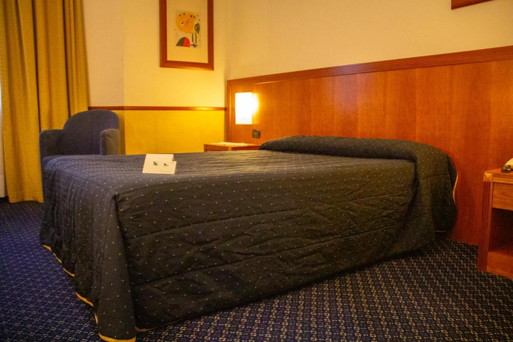 Bed in Pacific Hotel Fortino