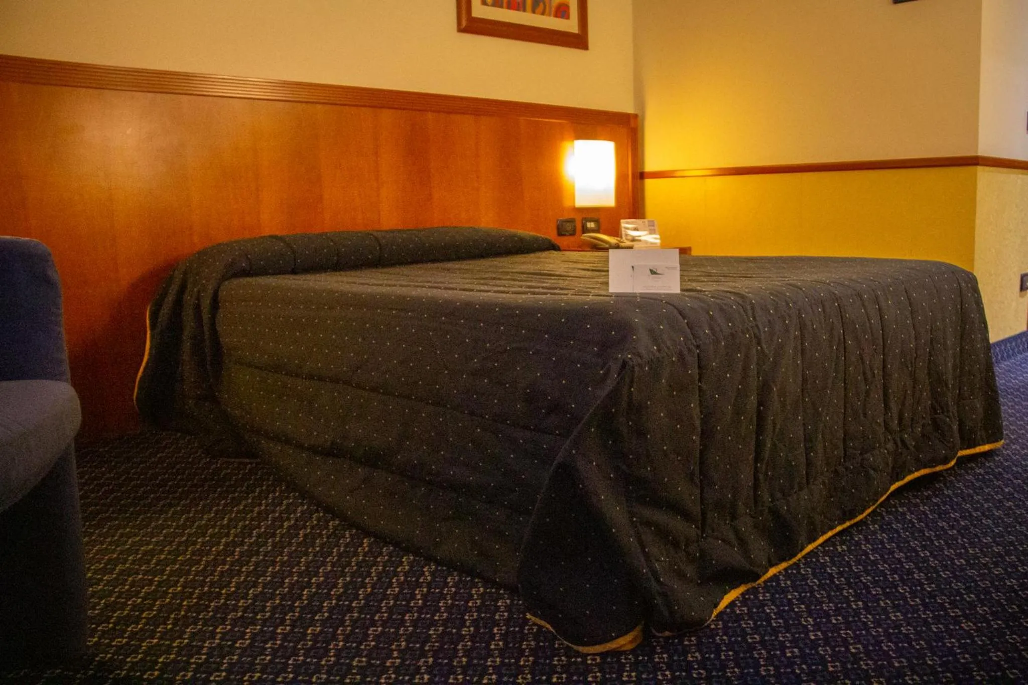 Bed in Pacific Hotel Fortino