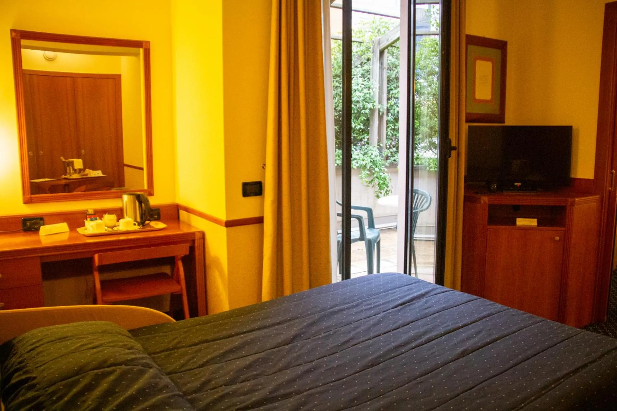 Bed in Pacific Hotel Fortino