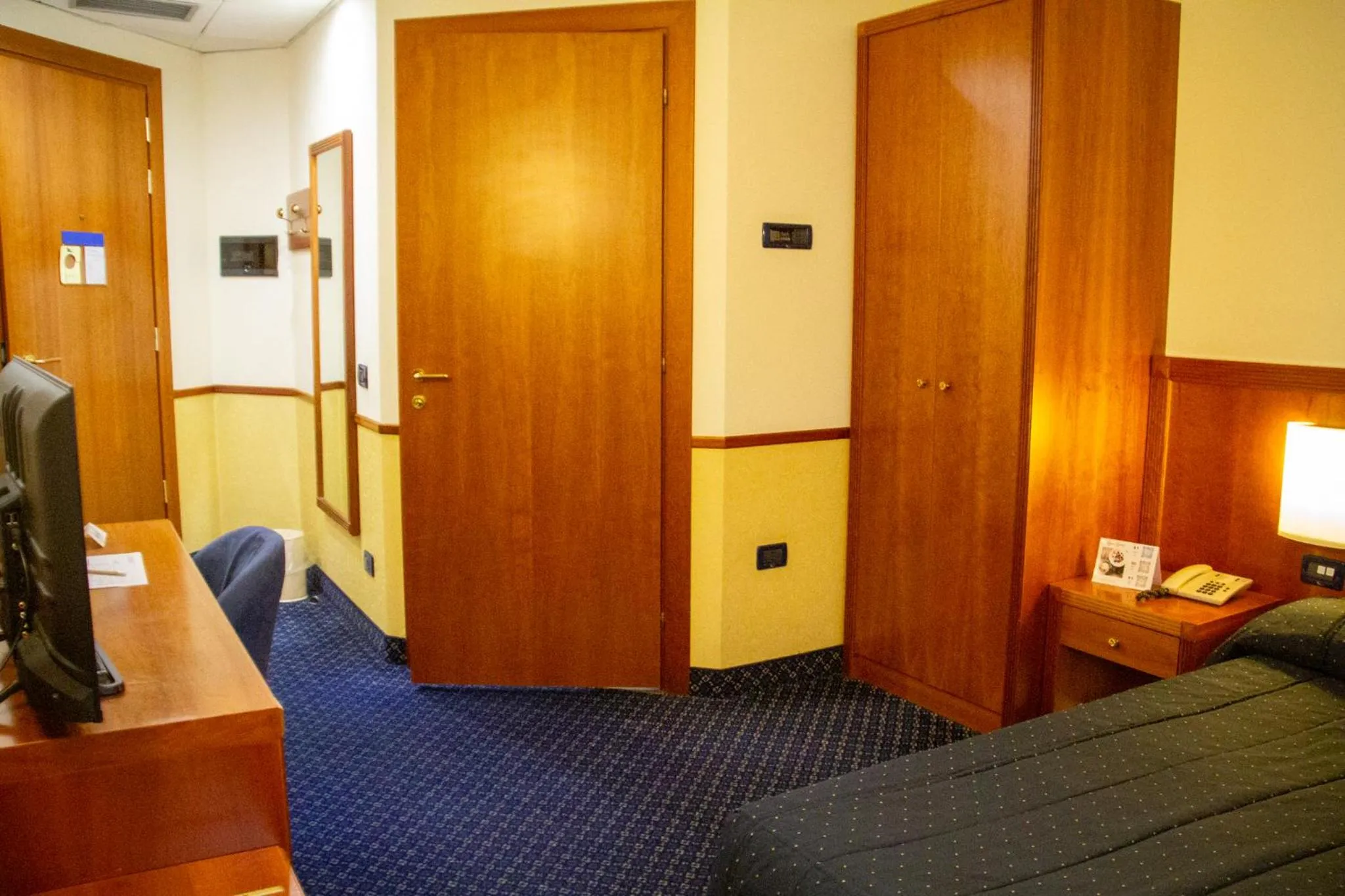 Bed in Pacific Hotel Fortino