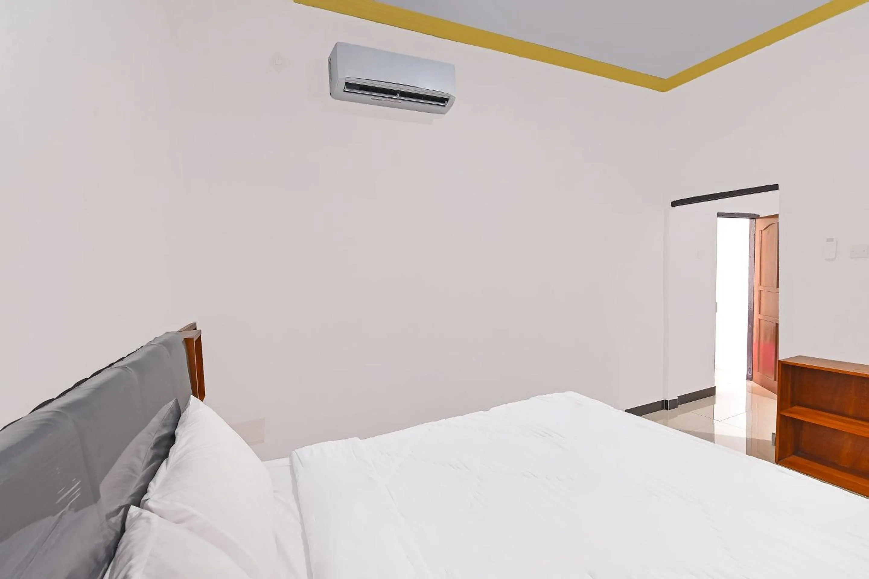 Bedroom, Bed in Hotel O Homestay Antara