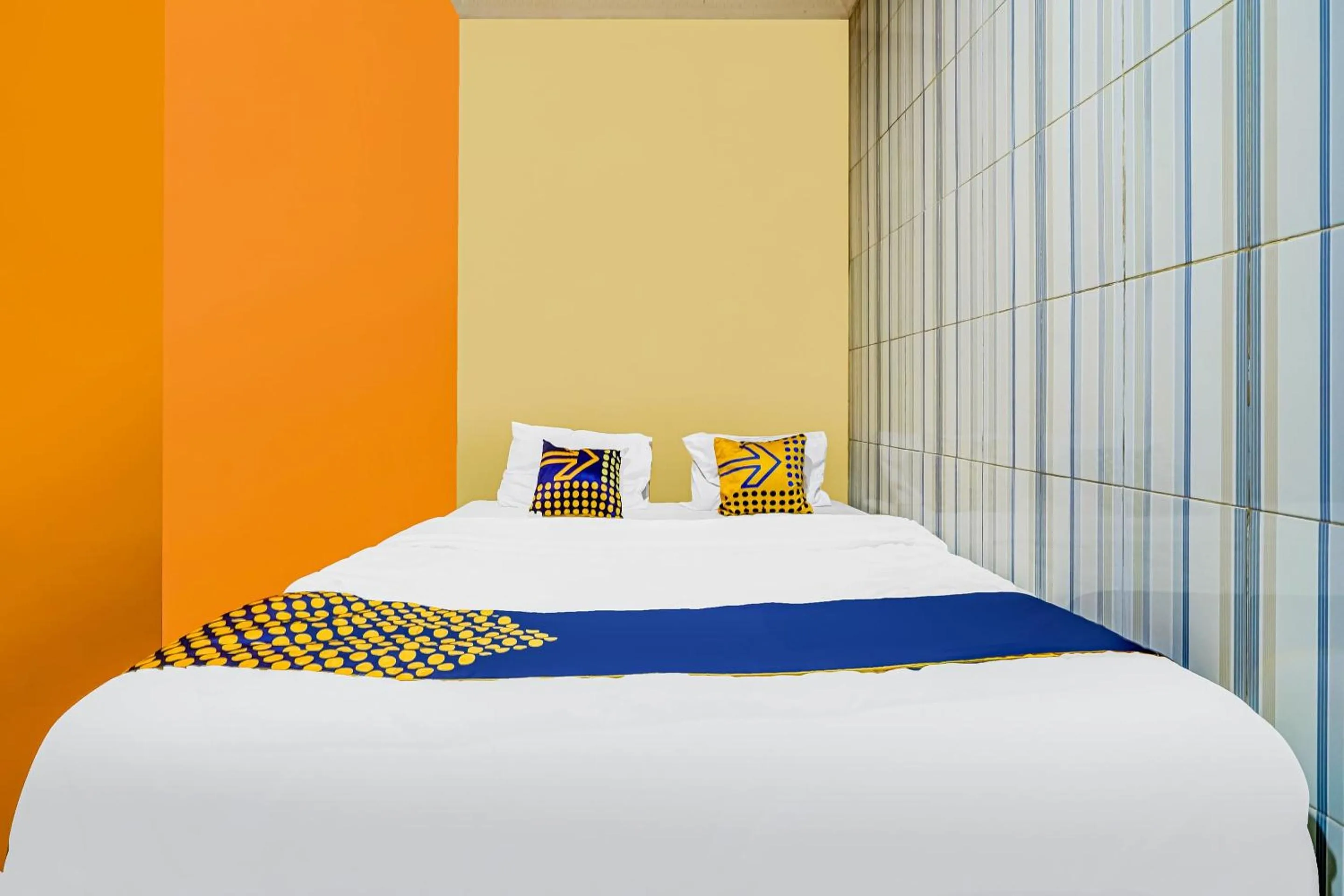 Bedroom in SPOT ON 91186 Losmen Yanti